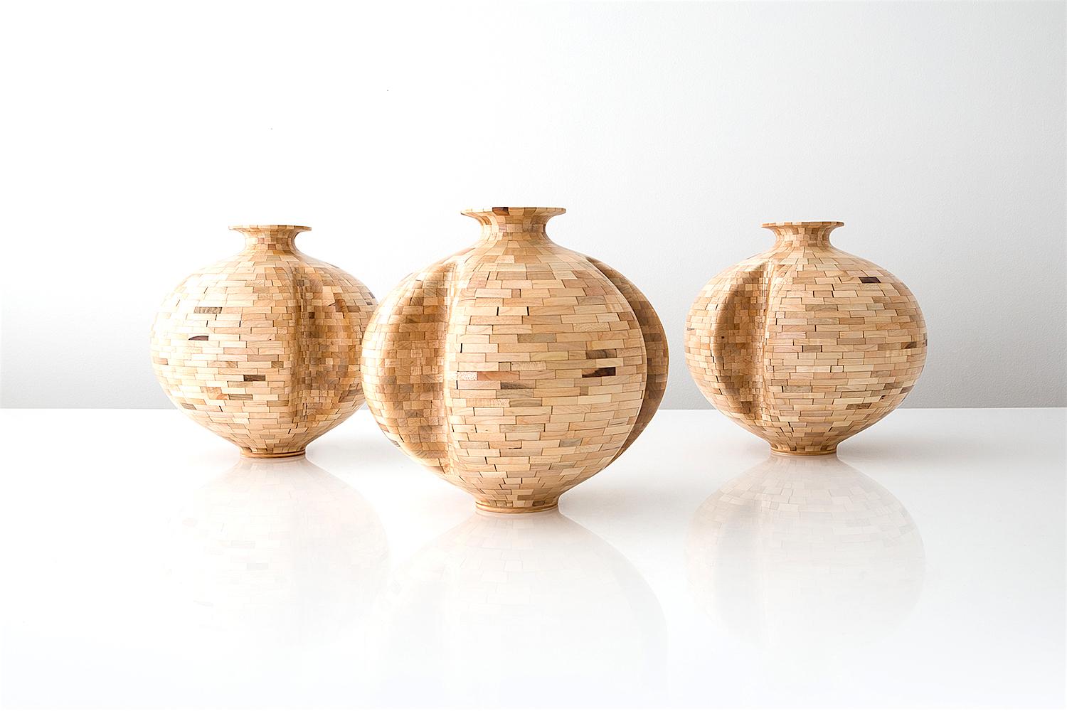 Contemporary American reclaimed maple stacked wood vessel with honed finish. The salvaged wood offcuts were sourced from a variety of local Brooklyn wood shops. The salvaged wood's natural coloring shows off tones ranging from ivory and pale yellow