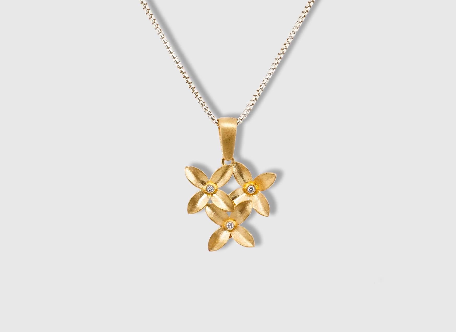 Triple Four-Petal Flower CharmPendant Necklace with Diamonds, 24kt Solid Gold by Prehistoric Works of Istanbul, Turkey. These pendants look great alone or paired with other coin pendants or with miniature pendants. Measures 18mm x 23mm. Diamonds,