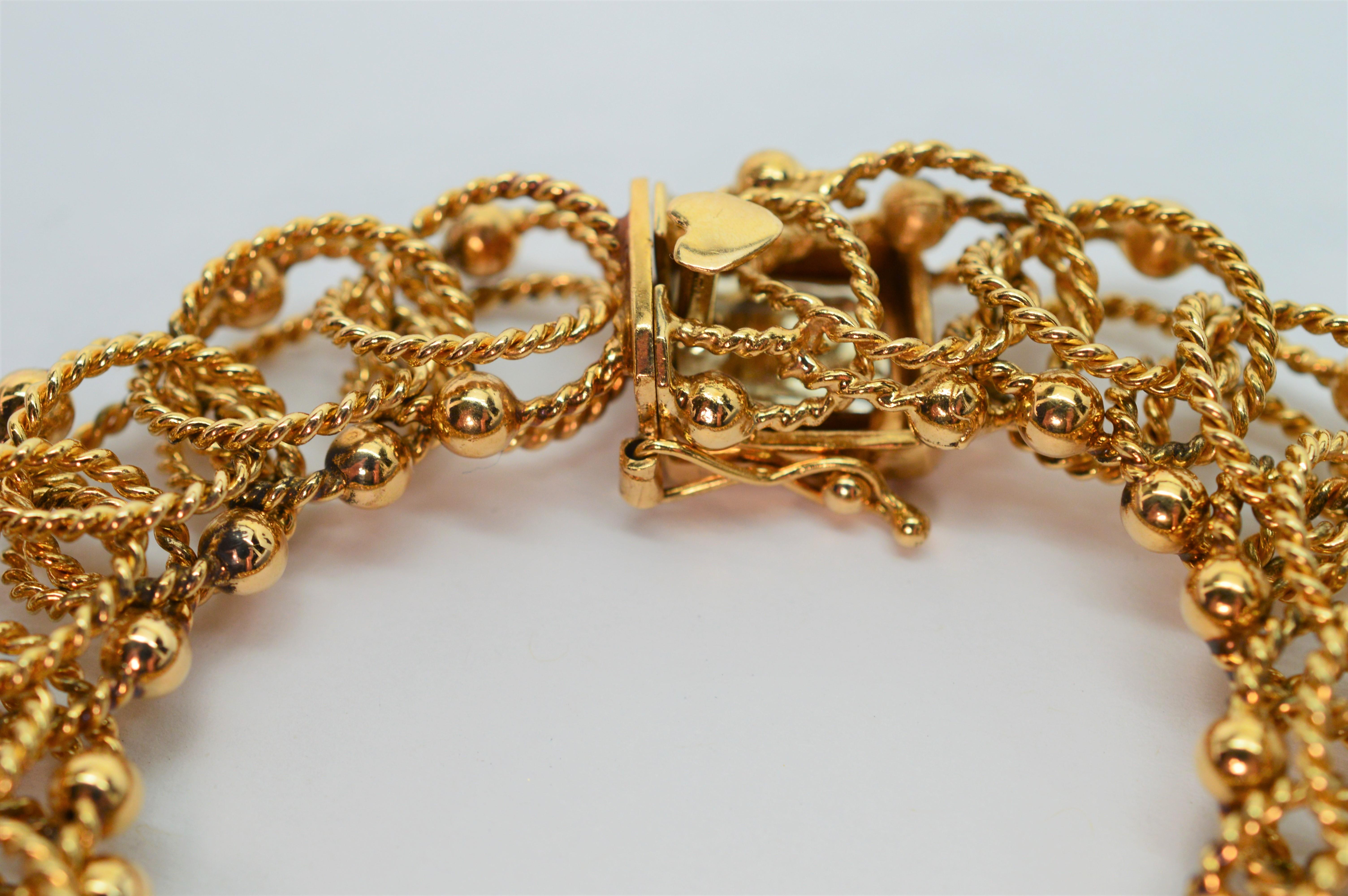 Triple Gold Rope Twist Link 14K Yellow Gold Charm Bracelet In Excellent Condition For Sale In Mount Kisco, NY