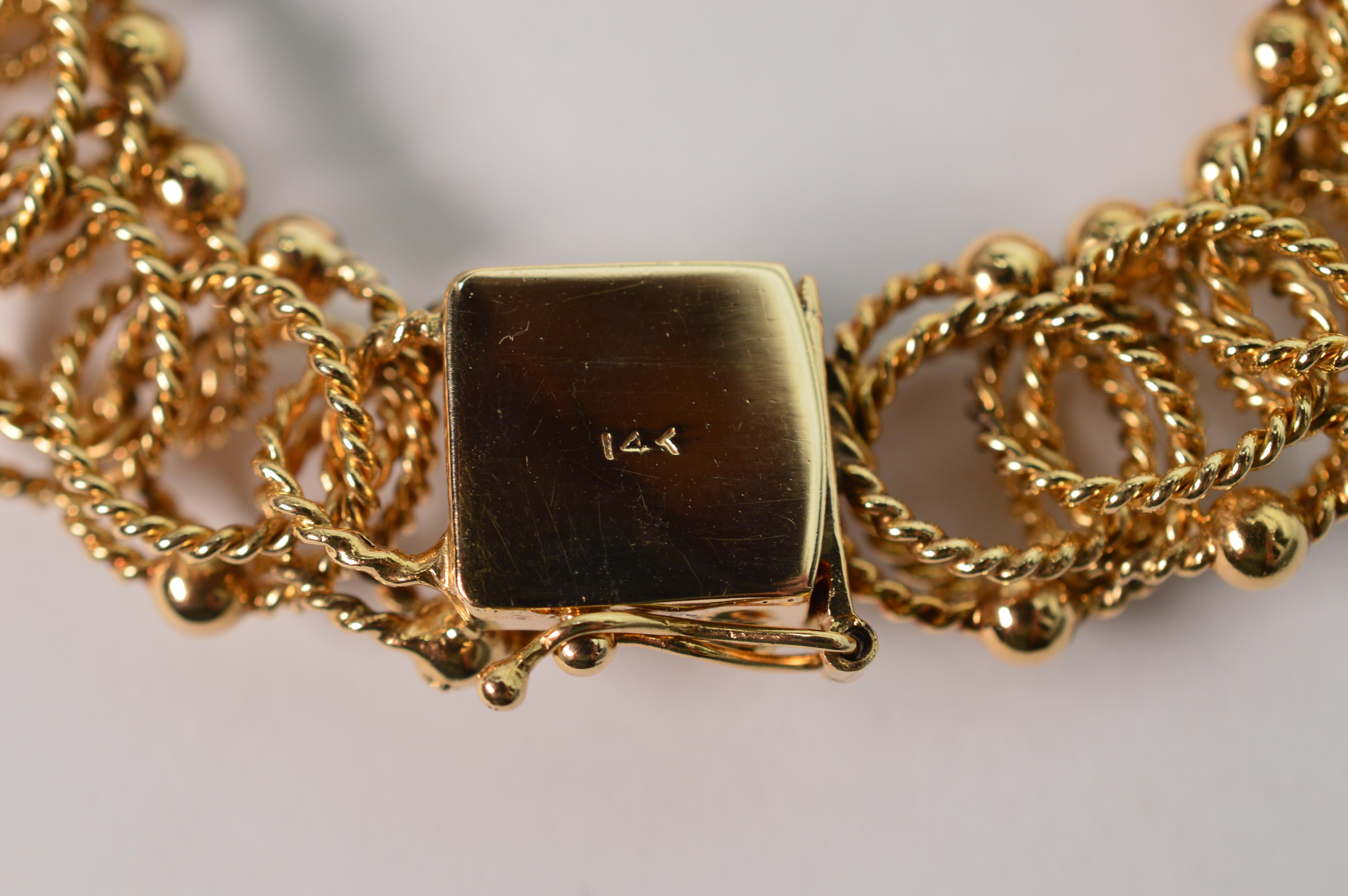 Bracelet à trois maillons tordus en or jaune 14 carats en vente 3