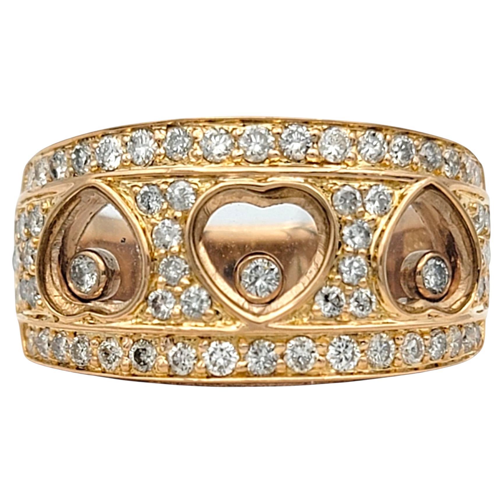Anello a fascia con diamante fluttuante e triplo cuore in oro rosa lucido 18 carati