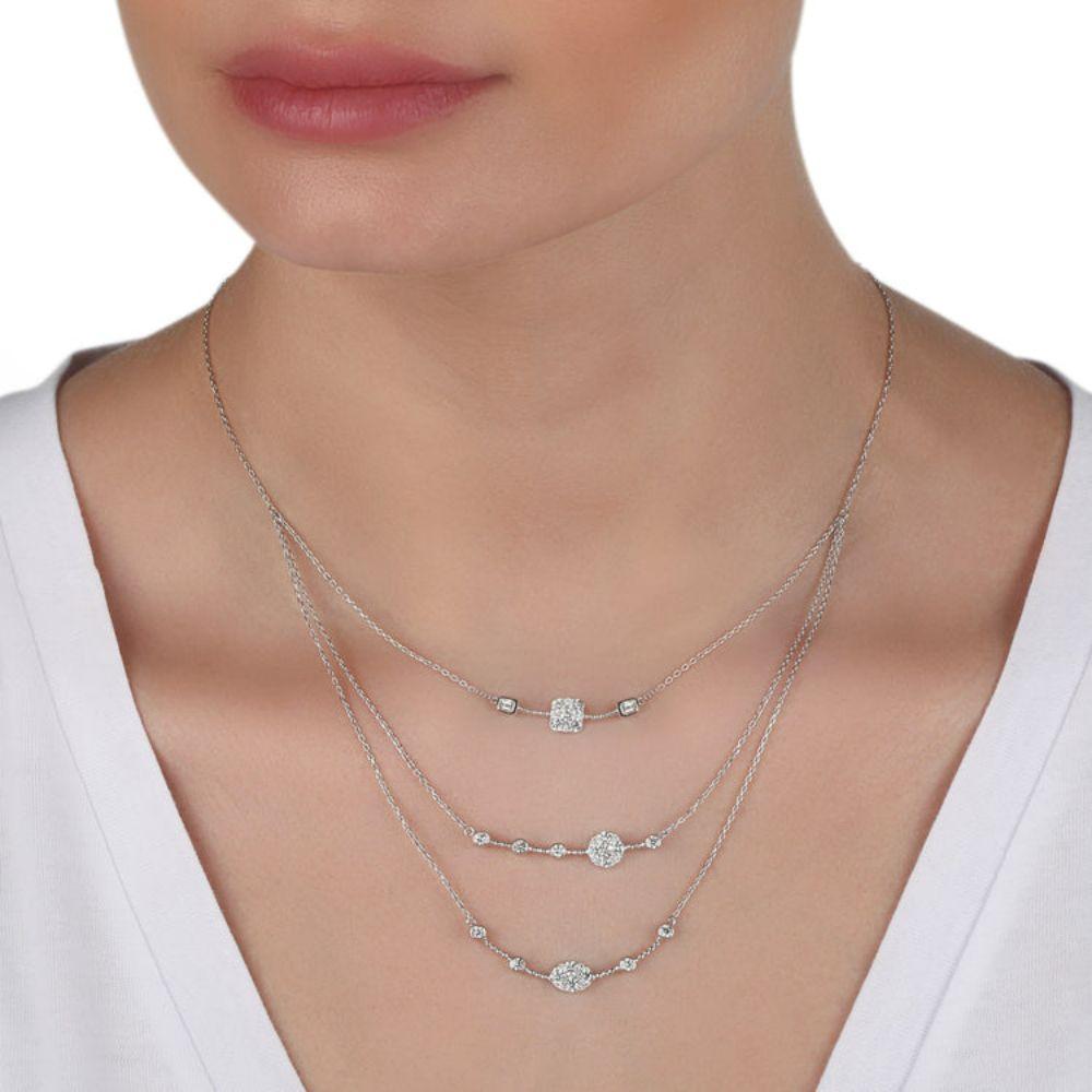 Triple Layer Multiple Cut Diamond Necklace in 18K White Gold

1.93 Cts of Diamonds, G-H Color, VS-SI Clarity
7.6 Grams of 18K White Gold

No two products are exactly same, therefore weights are approximate.