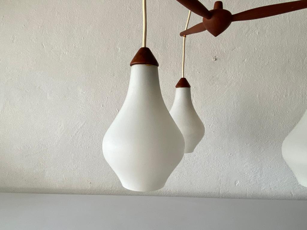 Triple Opal Glass & Teak Ceiling Lamp by Uno & Östen Kristiansson, 1960s Sweden In Good Condition For Sale In Hagenbach, DE