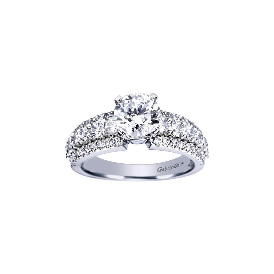 riple Pave Solitaire Design Diamond Engagement Mounting in 14k White Gold. Center diamond NOT included. Side diamonds weigh a total carat weight of 0.80 ctw, H color, SI clarity.