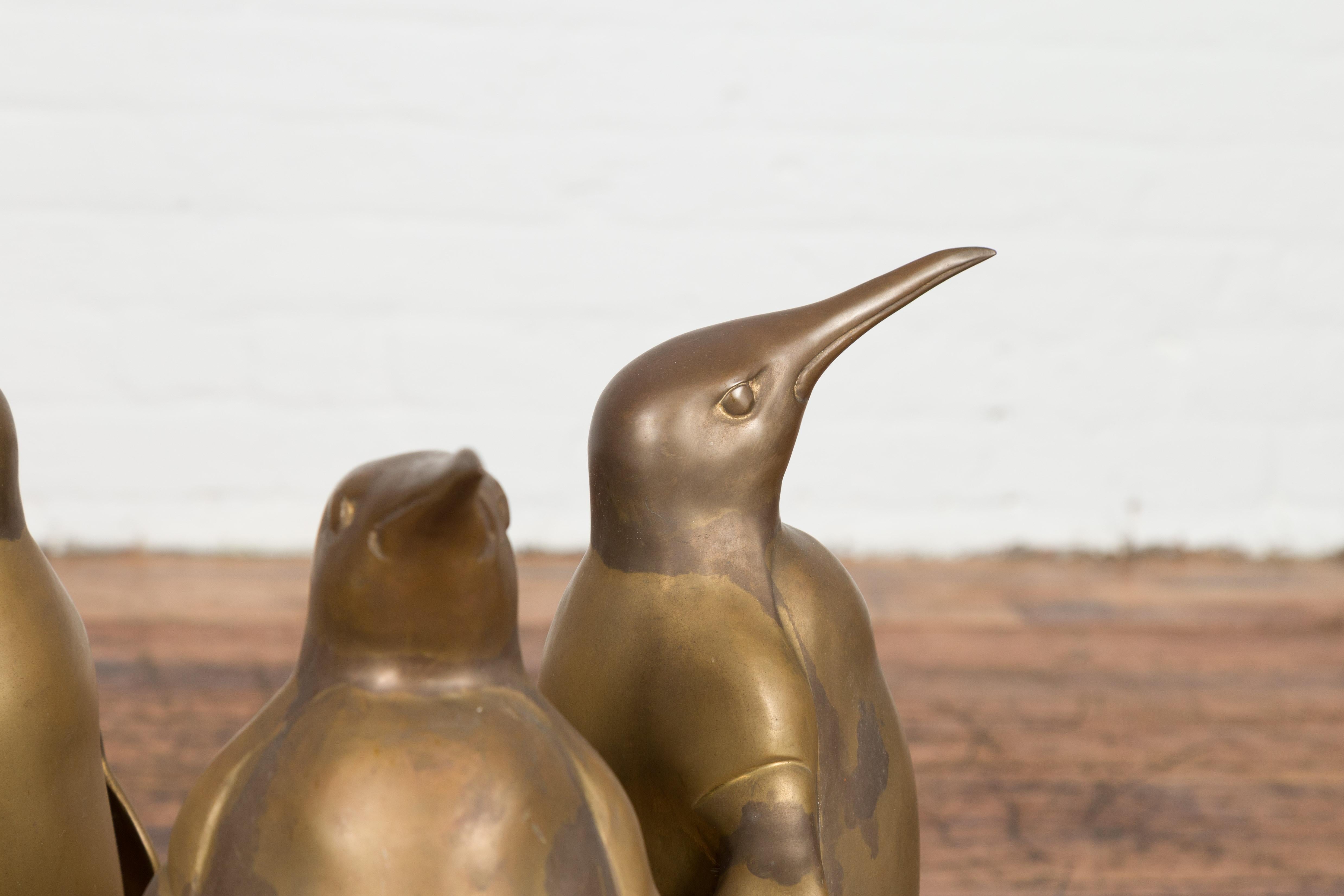 20th Century Triple Penguin Bronze Sculpted Group on Trefoiled Base with Gold Patina For Sale