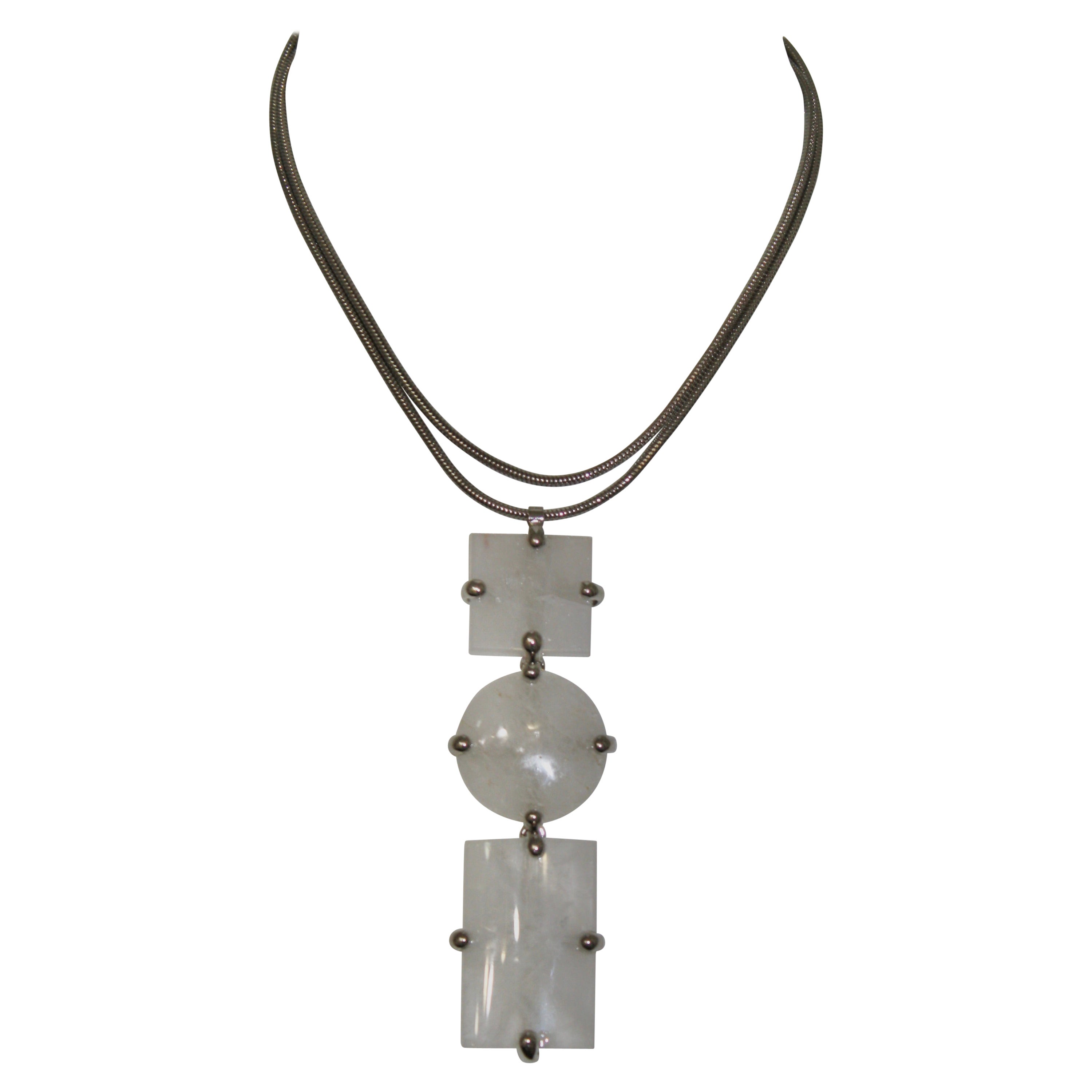 Triple RockCrystal Pendant on Palladium Chain .