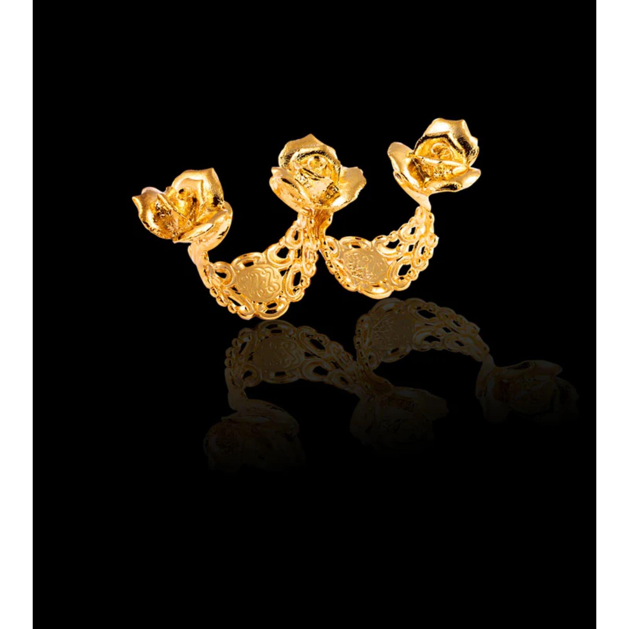 Sitting perfectly between the grooves of your fingers, the triple rosettes ring is the definition of delicate hand adornment. A luxurious double-knuckle ring handmade to fit just perfectly. Goes great with the matching tri-rosette earrings. Made in