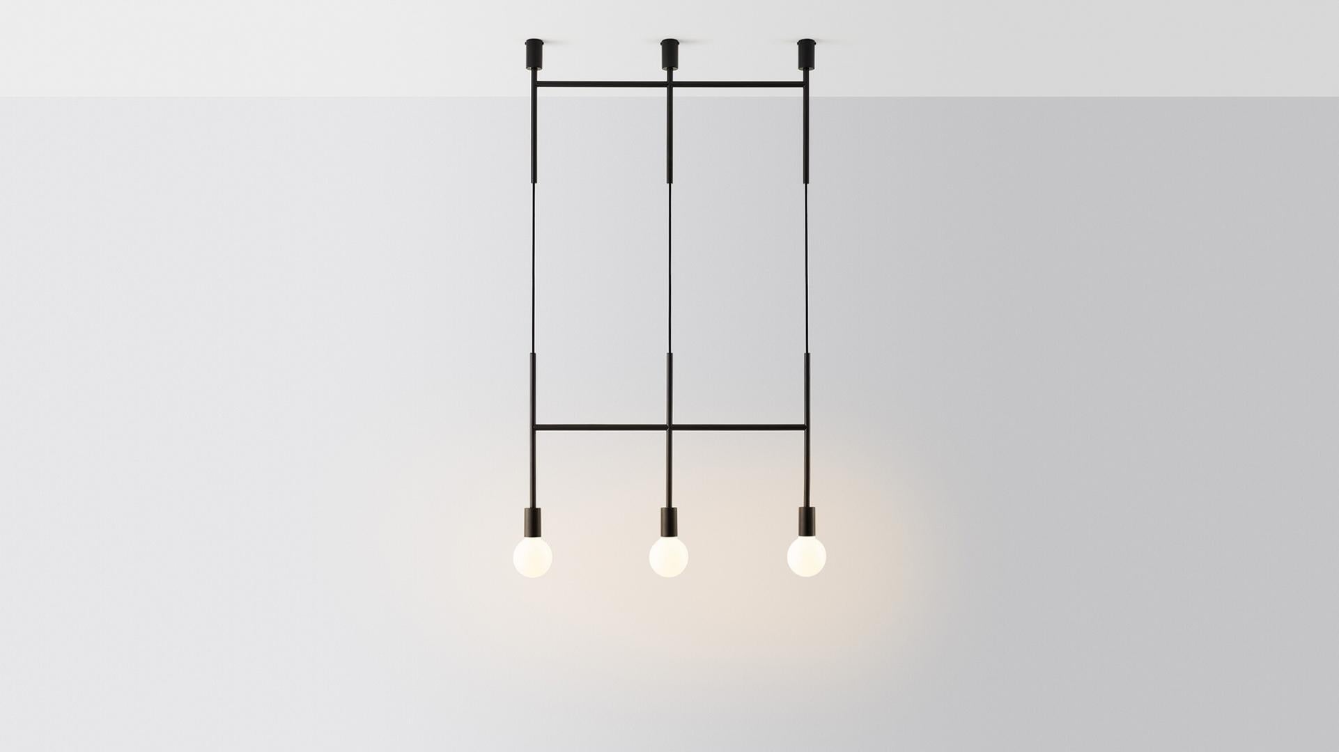 Triple step pendant light by Volker Haug
Dimensions: W 98.7 x H 108 cm 
Material: brass. 
Finishes: polished, aged, brushed, bronzed, blackened, or plated
Cord: Fabric or metal
Lamp: Opal G95 LED (E26/E27 110 - 240V, 12V version