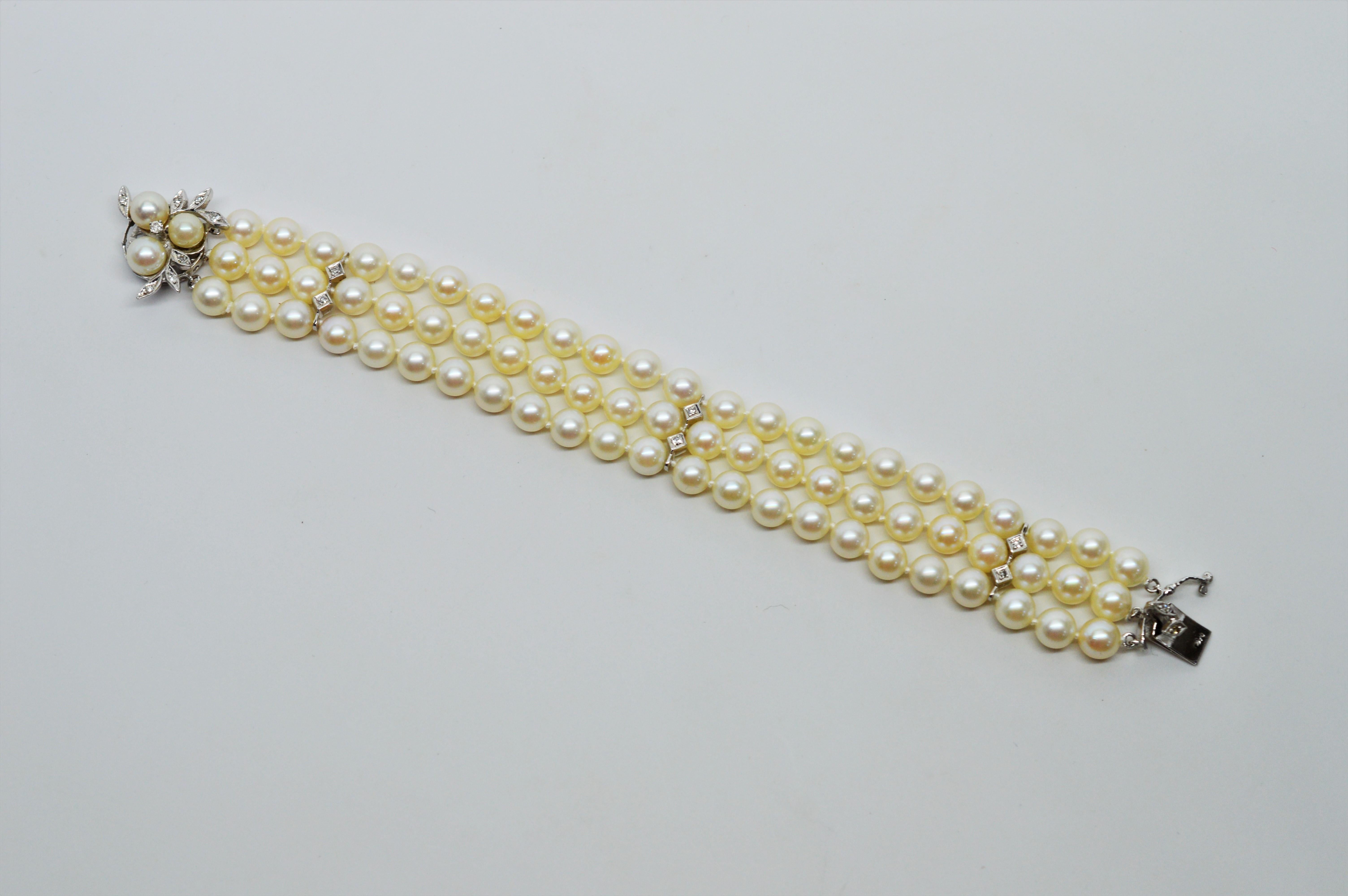 Brilliant Cut Triple Strand Akoya Pearl Bracelet w White Gold Diamond Floral Charm Clasp