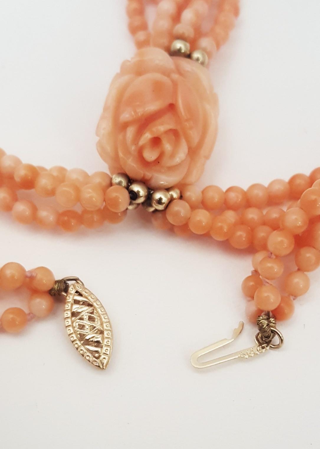 Triple Strand Coral Beads, Carved Coral Flower, 14 Karat Beads Tassel Necklace In Excellent Condition In Palm Beach, FL