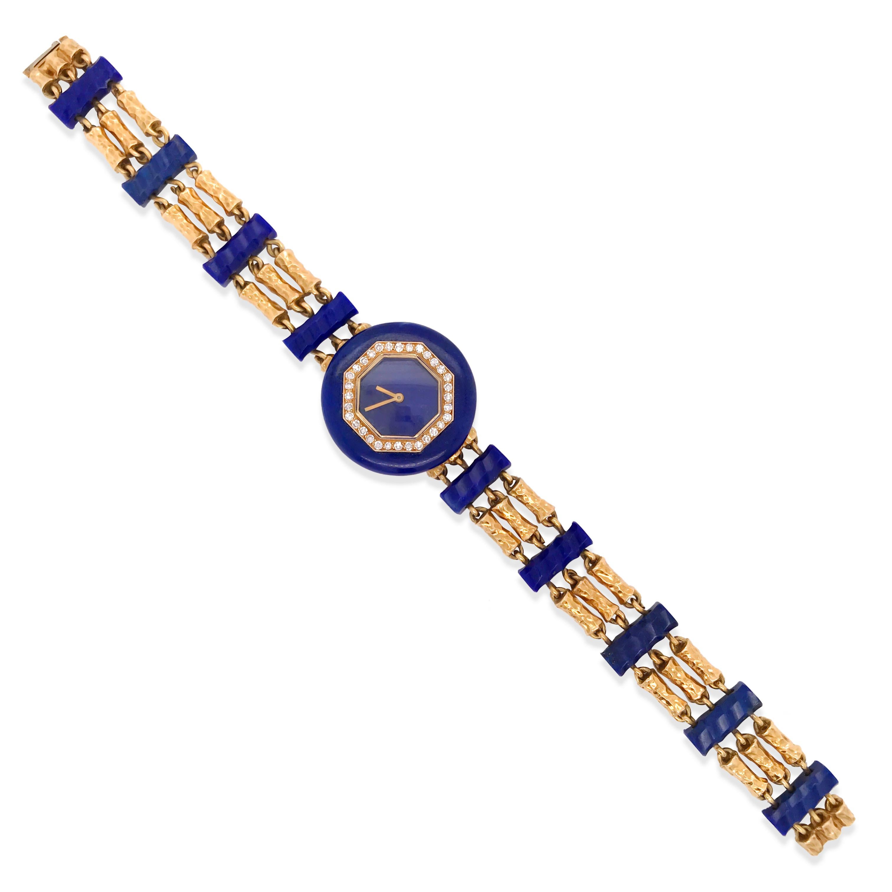 This authentic Boucheron mechanical watch rendered in 18K yellow gold, is centered with a lustrous octagonal lapis dial with visible pyrite line and slightly white line. Framed by 32 single-cut diamonds within a circular bright deep royal blue lapis