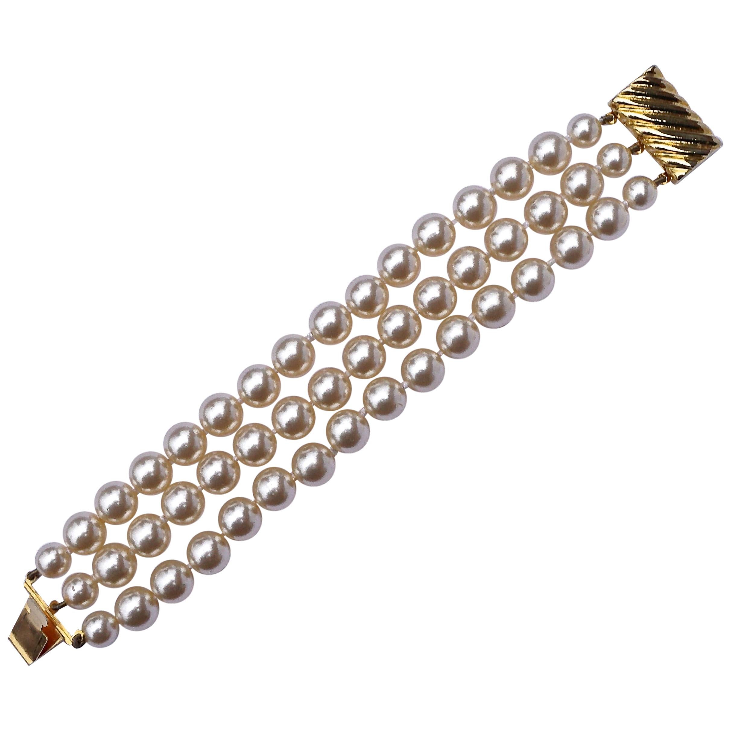 Triple Strand Knotted Faux Pearl Bracelet with a Fancy Gold Tone Clasp
