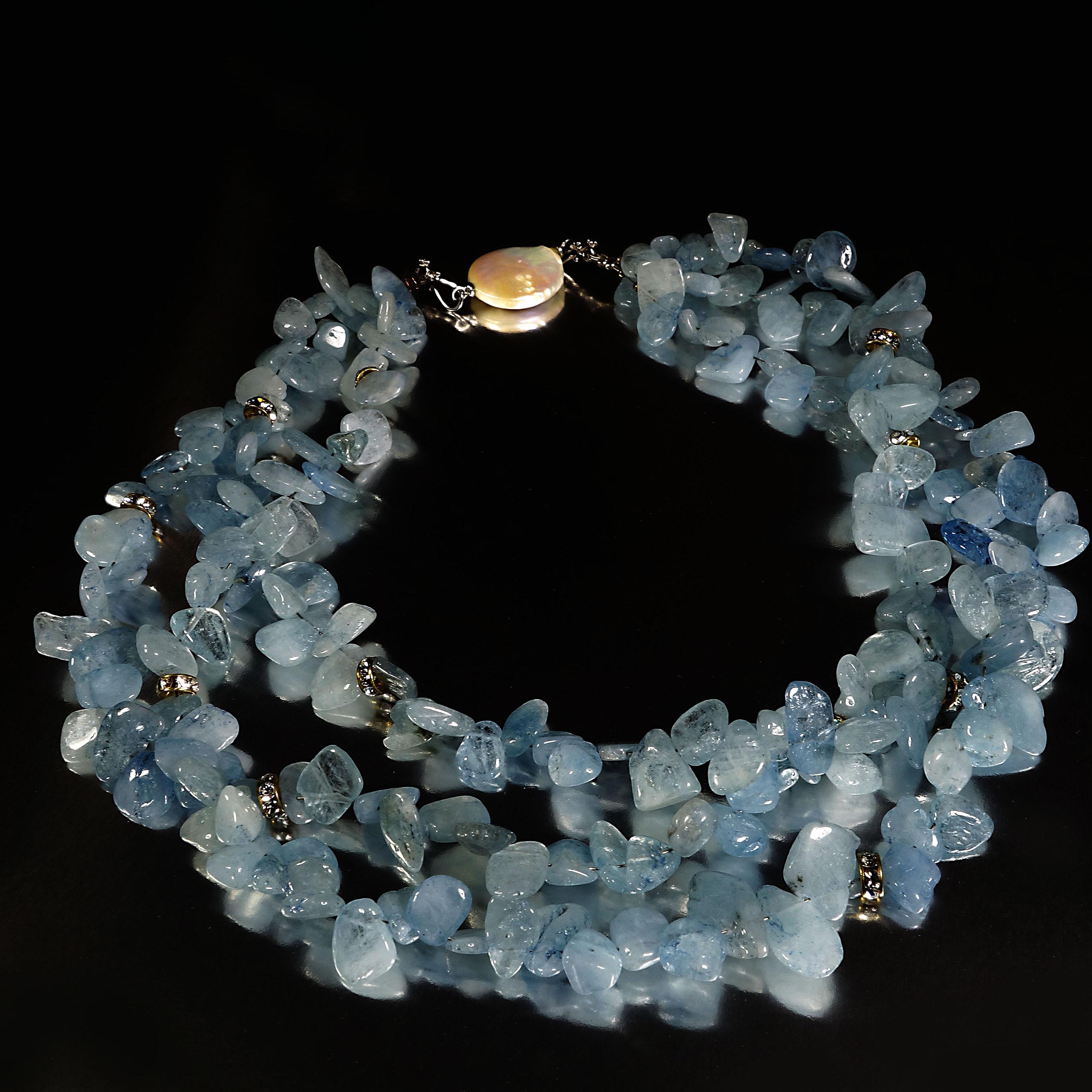Polished Aquamarine Chips Necklace in three strands with sparkly crystal rondels. This necklace pops and sparkles! The lovely translucent aquamarine chips are accented by the sparkly rondels. Aquamarine is March's birthstone. The necklace is 18