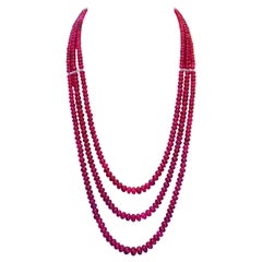 Triple Strand Ruby Bead Necklace with Faceted Diamond Cut White Gold Bar Spacers