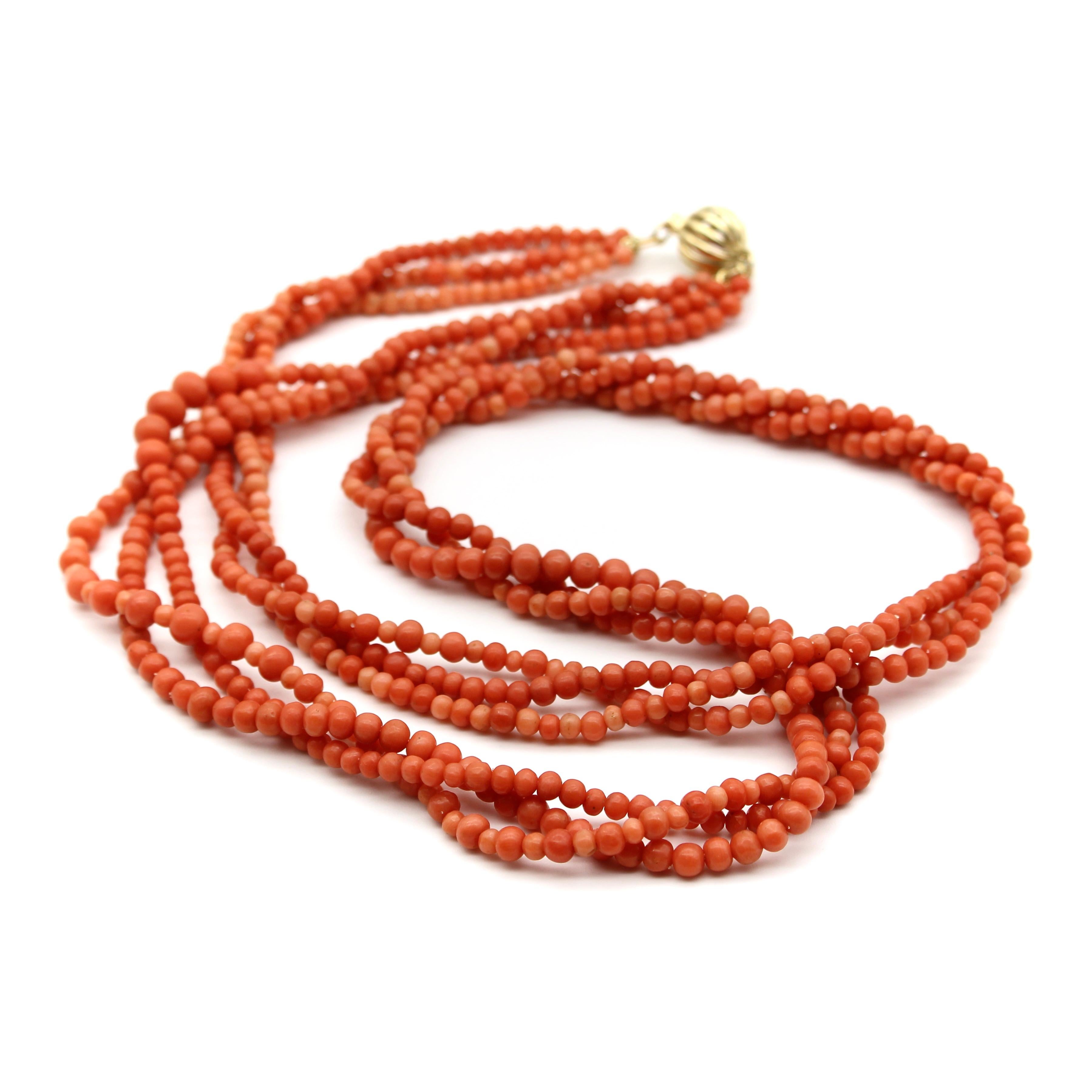 This is a beautiful vintage, deep dark reddish pink natural coral necklace made of many various size round beads. The beads are all unique in size, varying from 3-5 mm in size. The triple string necklace has recently been re-strung but the beads are