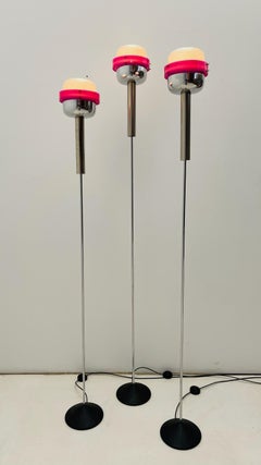 Triplet of Stilnovo floor lamps in magenta plexiglass