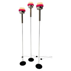 Triplet of Stilnovo floor lamps in magenta plexiglass