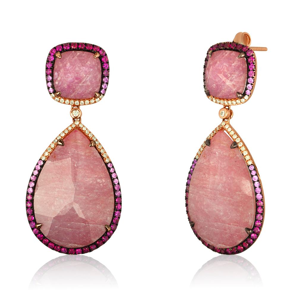 Stunning Pink Sapphire Gemstones set in Rose 14K Gold, surrounded by Diamonds and Multi-Color Sapphires.
Sliced to display their natural variations in character, pink sapphires are layered over mother-of-pearl and topped with faceted clear rock
