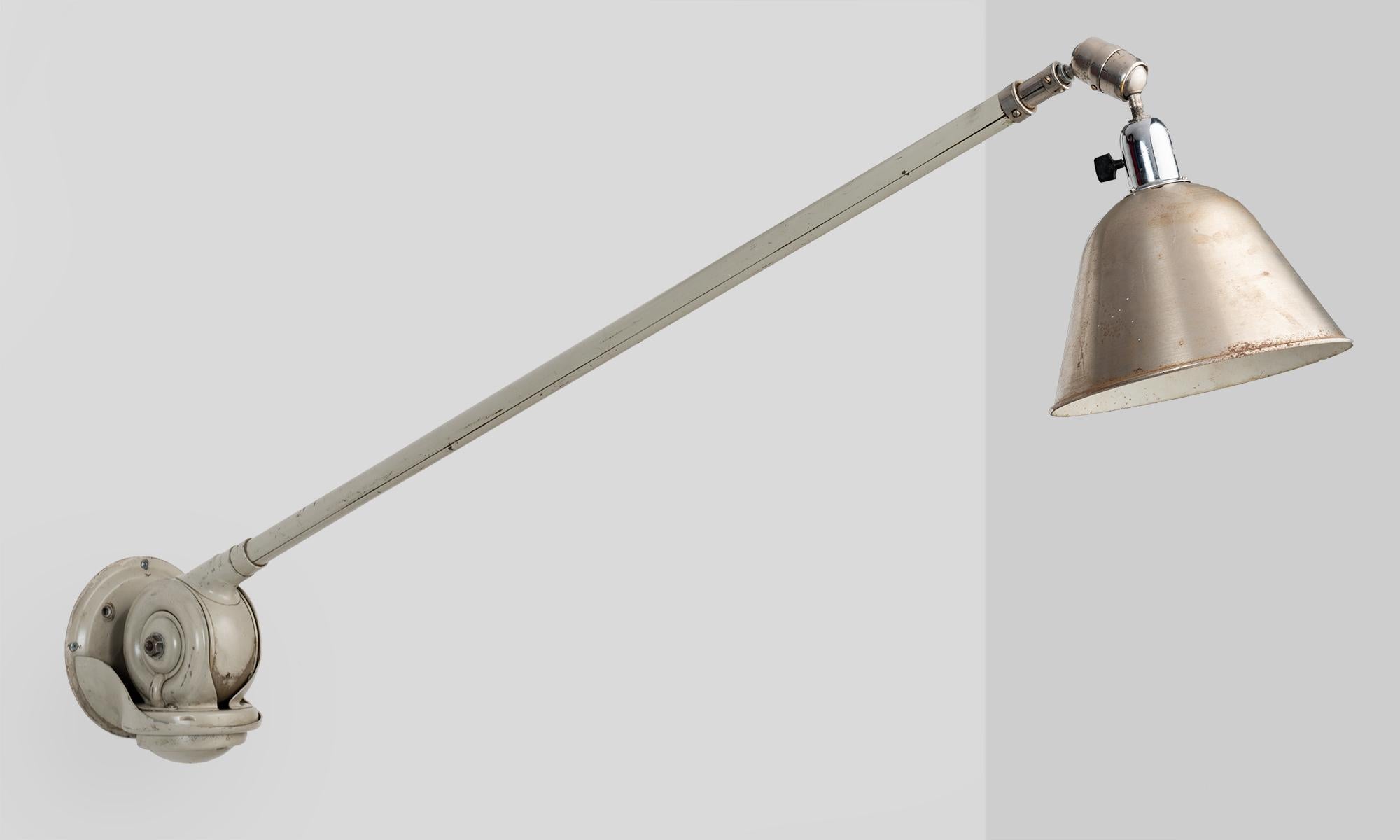 Triplex Industrial Lamp by Petter Johansson, Sweden, circa 1940

Extraordinary telescopic light, constructed from steel and aluminum, with original paint and natural patina.

Depth has 52 to 142