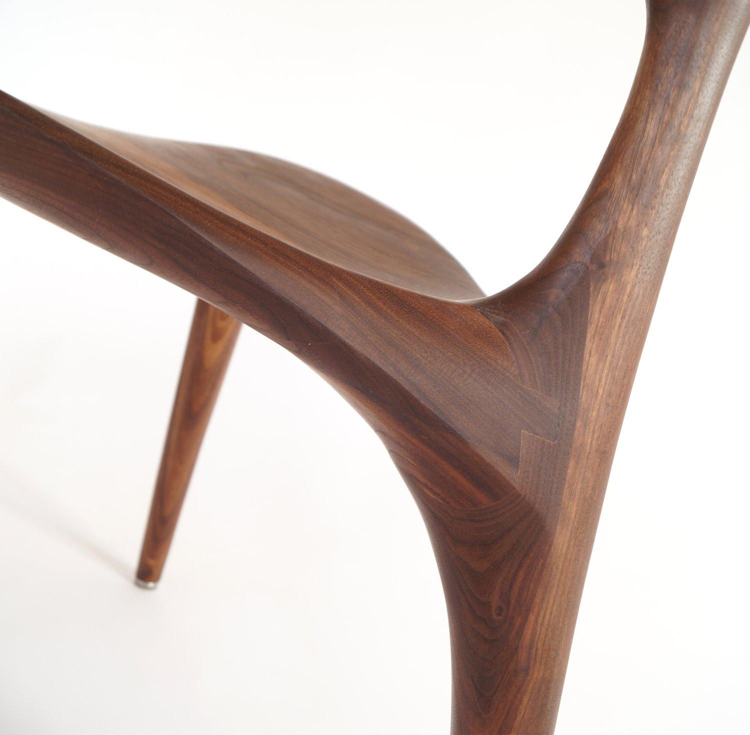 Triplex MS22 dining room chair handcrafted and designed by Morten Stenbaek
2018
Dated 
Signed and numbered
Dimensions: W 58 x D 55 x H 74 cm
 Seat 45.5 cm
Materials: Walnut and linseed oil finish

Elegant and sculptural chair.

When Morten