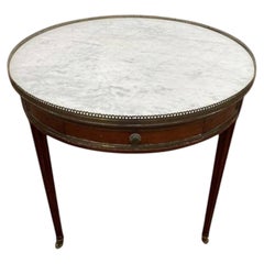 Table bouillotte à trois pieds de style Louis XVI