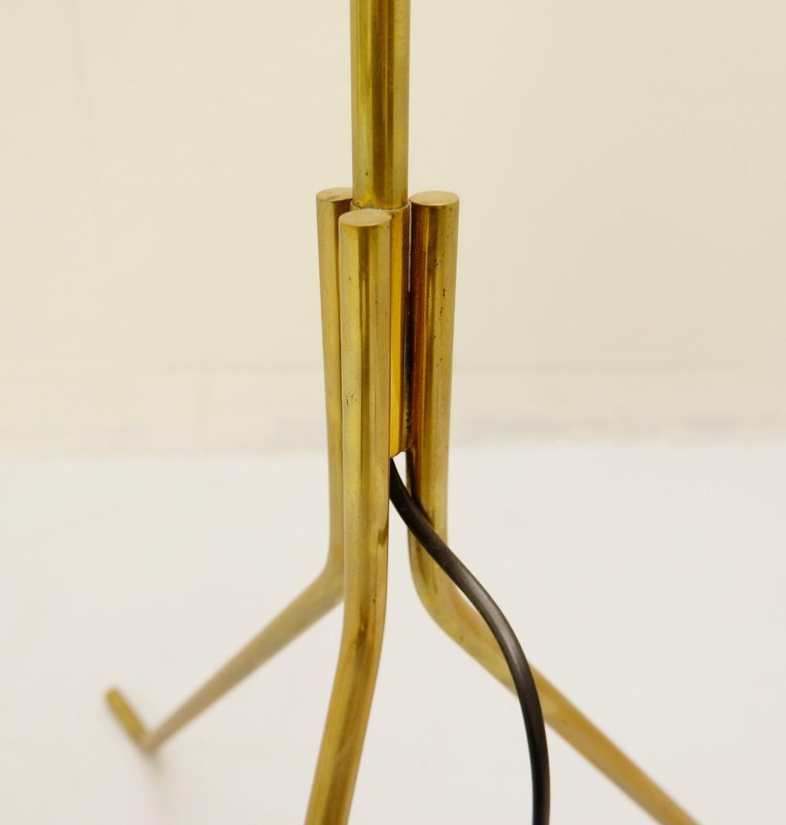 Tripod brass floor lamp.