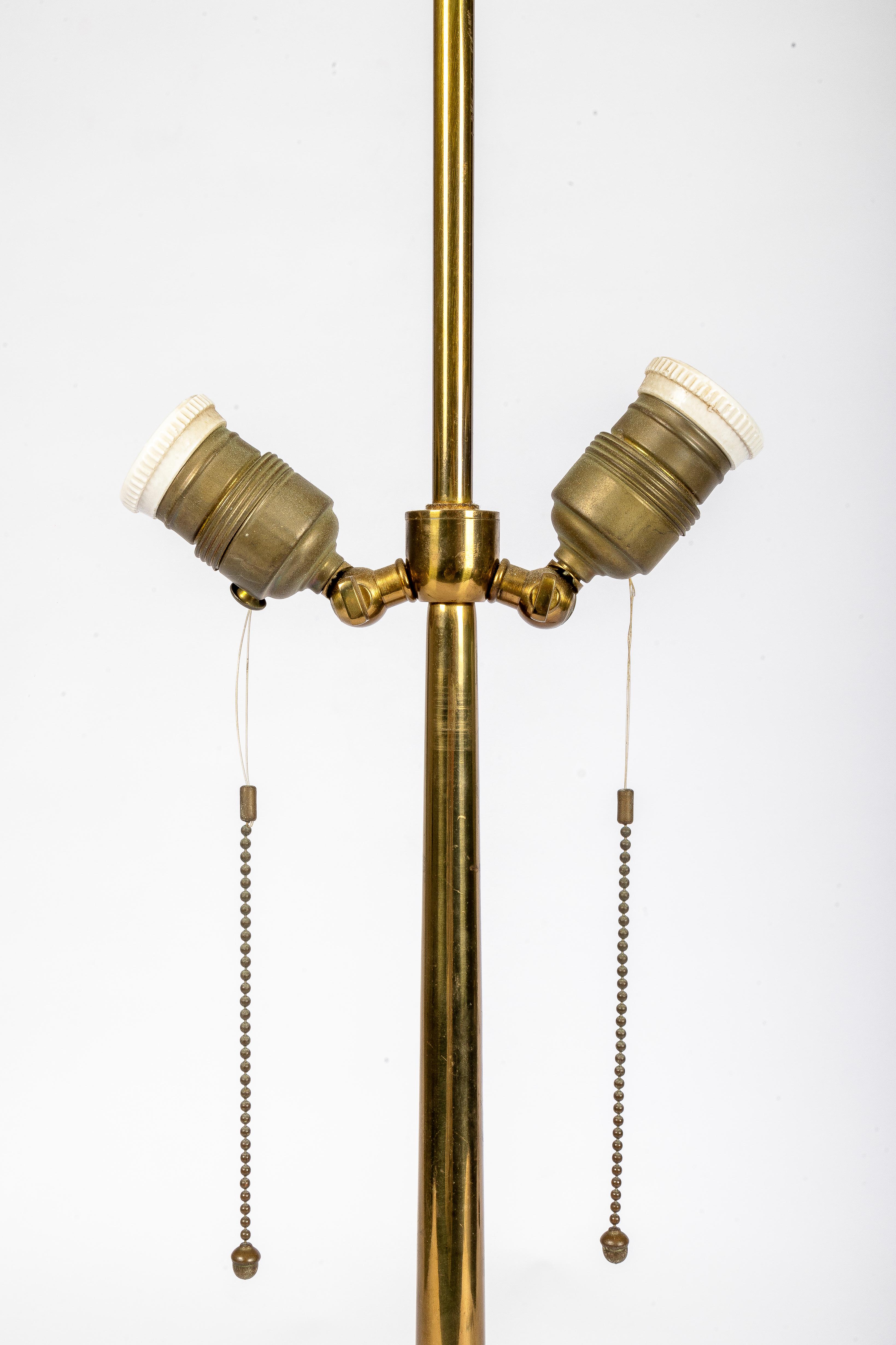 Molded Tripod brass Maison Jansen-style table lamp For Sale