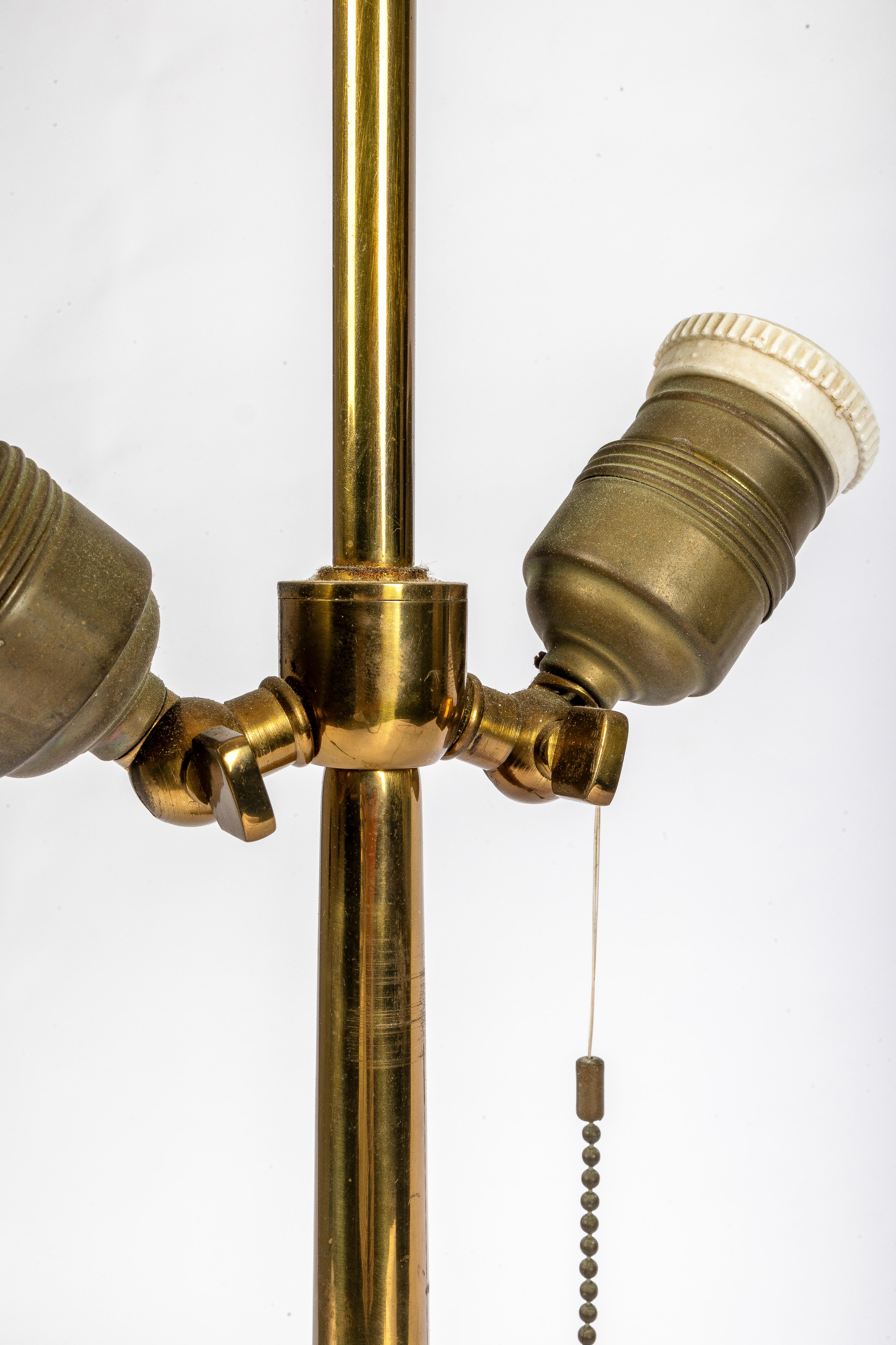 20th Century Tripod brass Maison Jansen-style table lamp For Sale