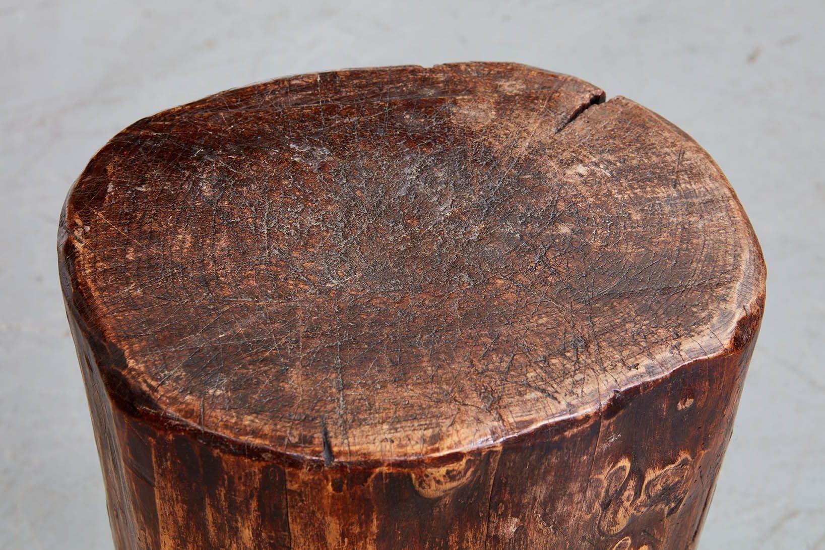 A vernacular cheese display table, also known as a dairy table, England, circa 1840, in oak on three hand-hewn legs. These tables were found in dairy shops to display rounds of cheese on their tops. Now a useful and interesting drinks table. Still