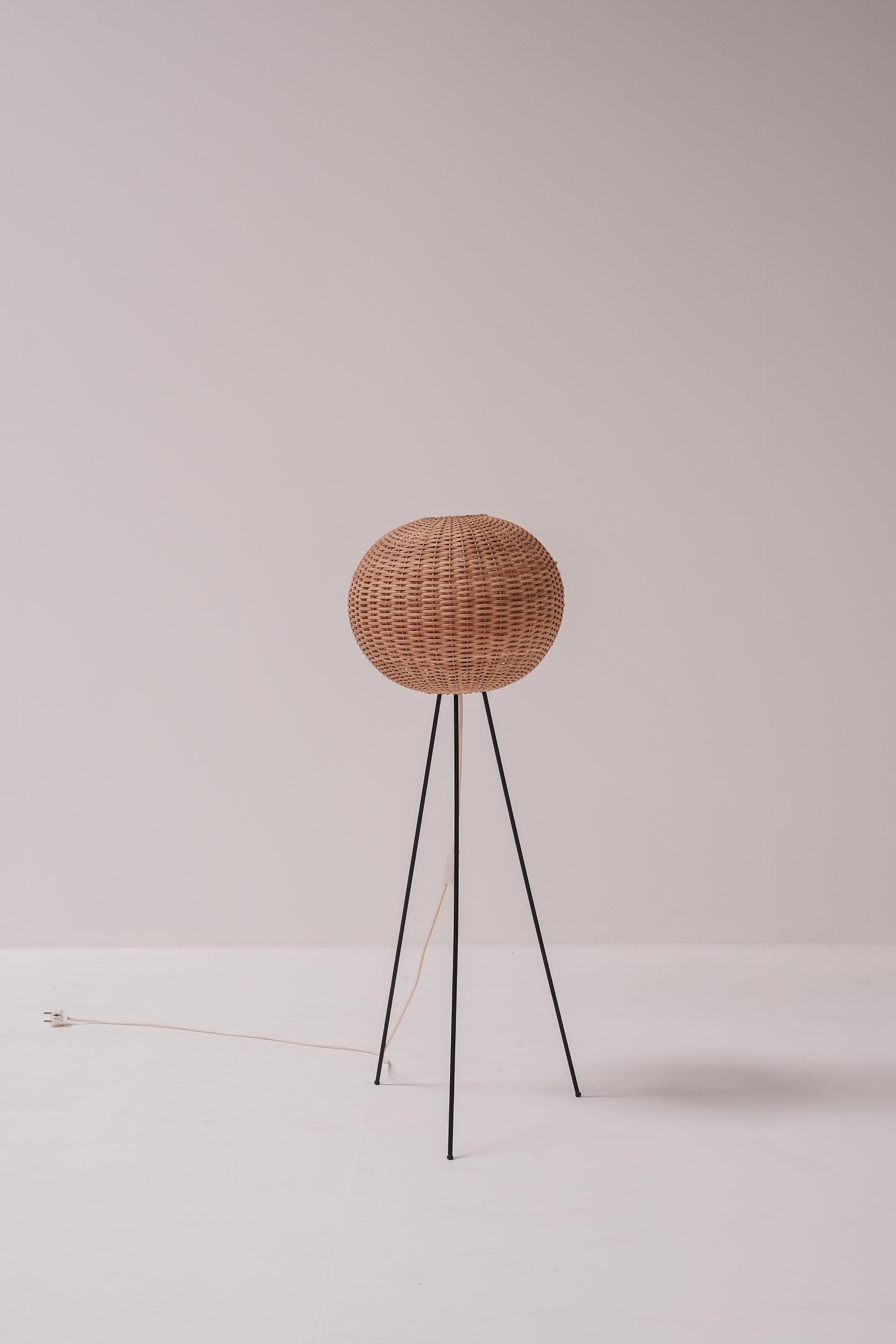 Rattan woven cocoon lamp, made in Germany 1970ties. 

This lamp is easy to disassamble, the base can be easily taken off for transport. 