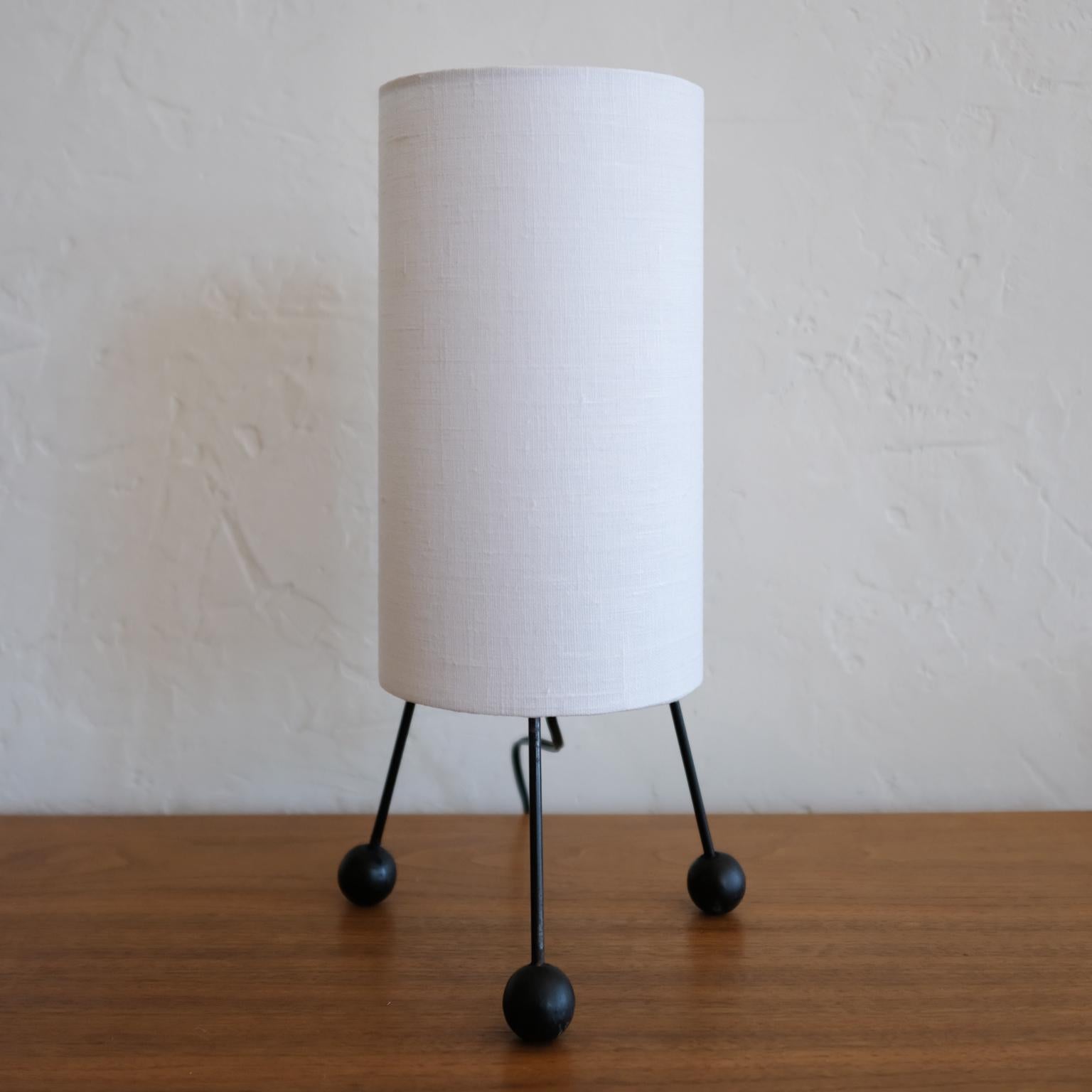 Tripod cylinder table lamp with wood ball feet. New linen shade, 1950s.