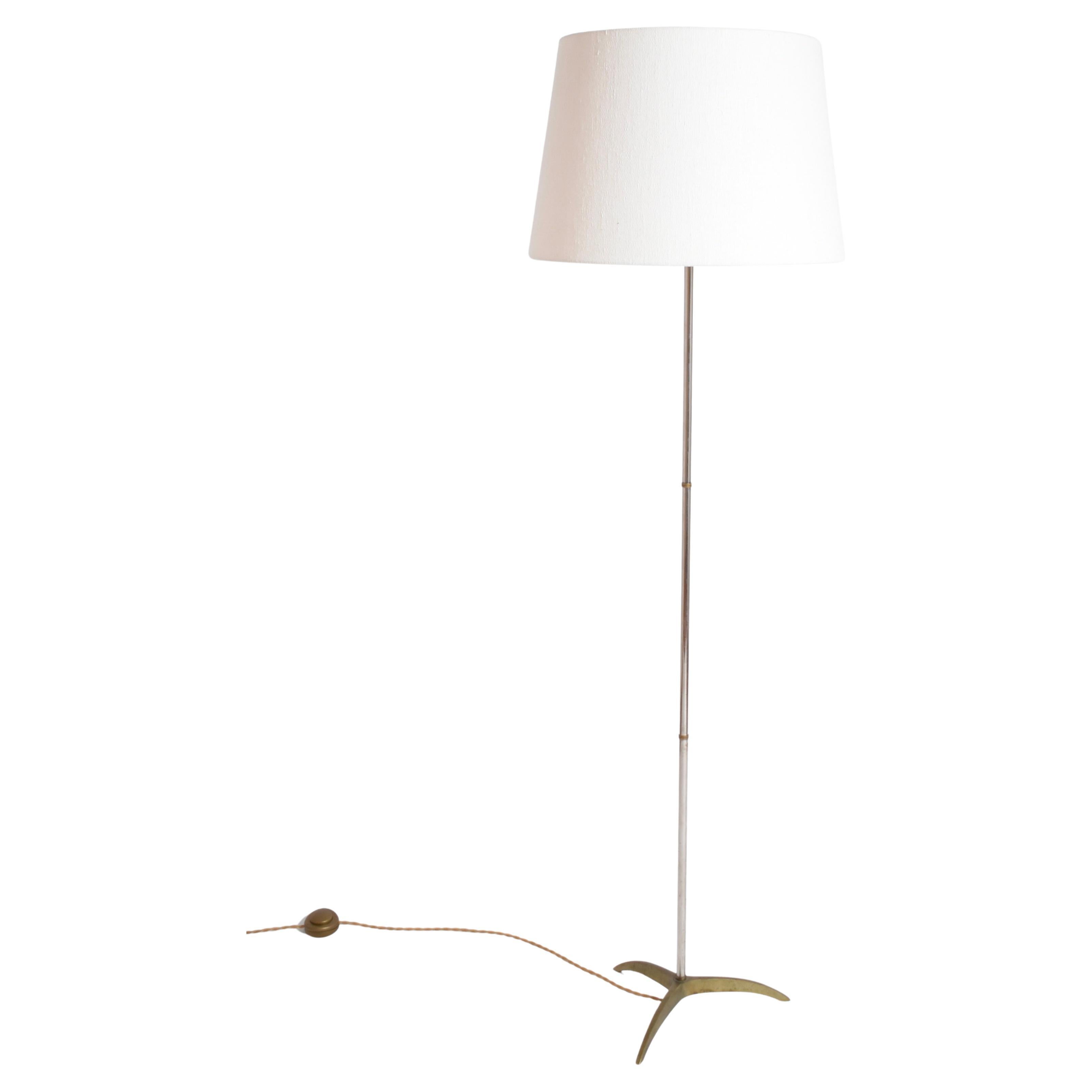 Tripod floor lamp attributed to Maison Jansen, 1960s.