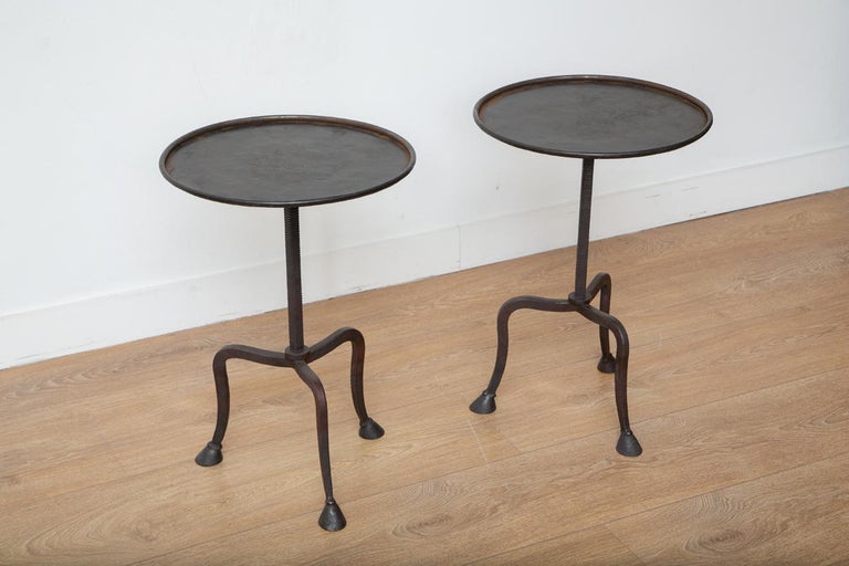 Tripod hand-forged side or drinks tables, in stock.
Hand-forged iron legs and stem, round top with lip
Hoof feet, 
Dark bronze patina.
Pefect for drinks, side, end tables.
Can be sold individually.
Ready to ship from our showroom in Miami.