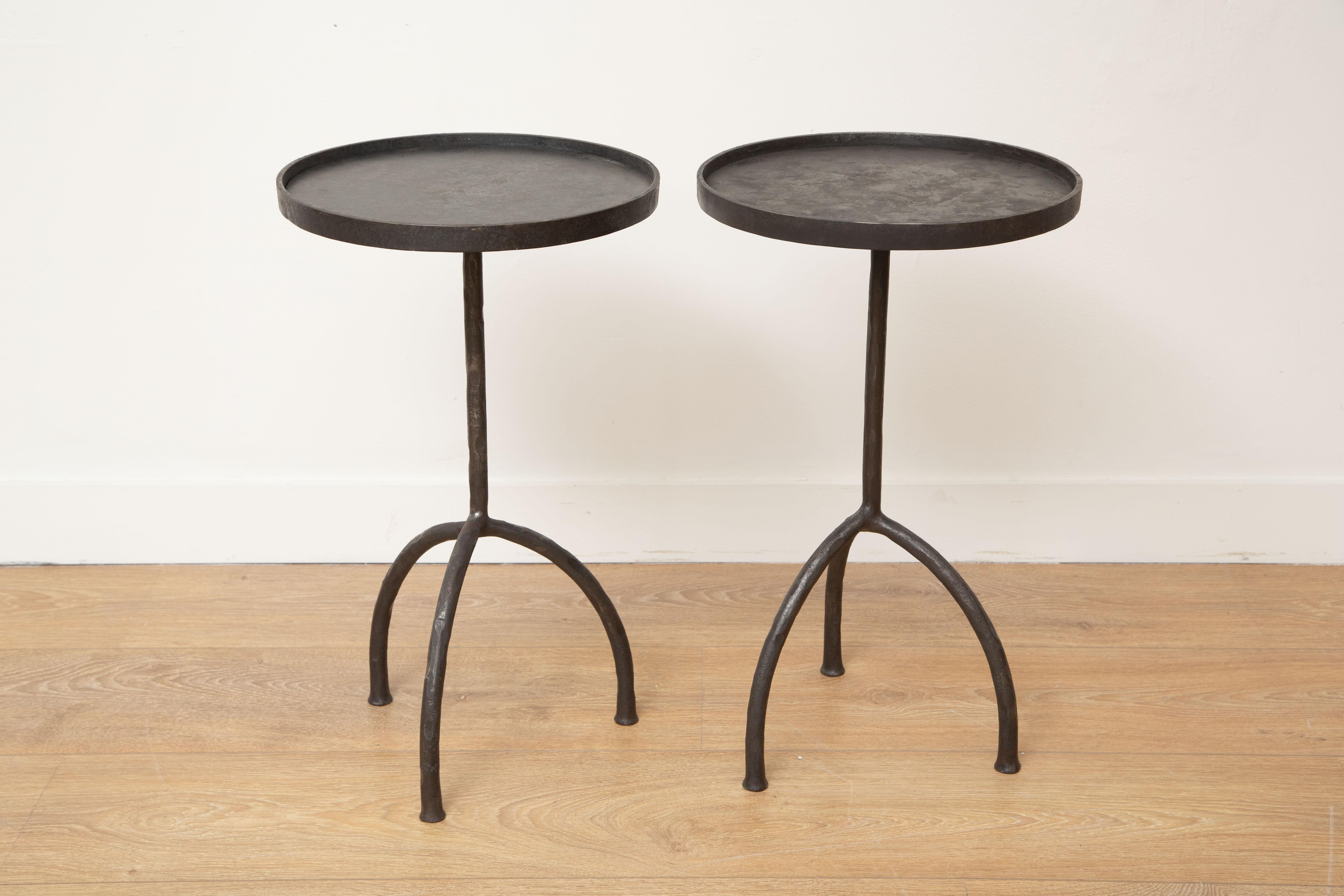 Custom tripod hand-forged side or drinks tables, in stock
Hand-forged iron legs, round top with lip
Dark bronze patina
Pefect for drinks, side, end tables
Can be sold individually
Ready to ship from our showroom in Miami.