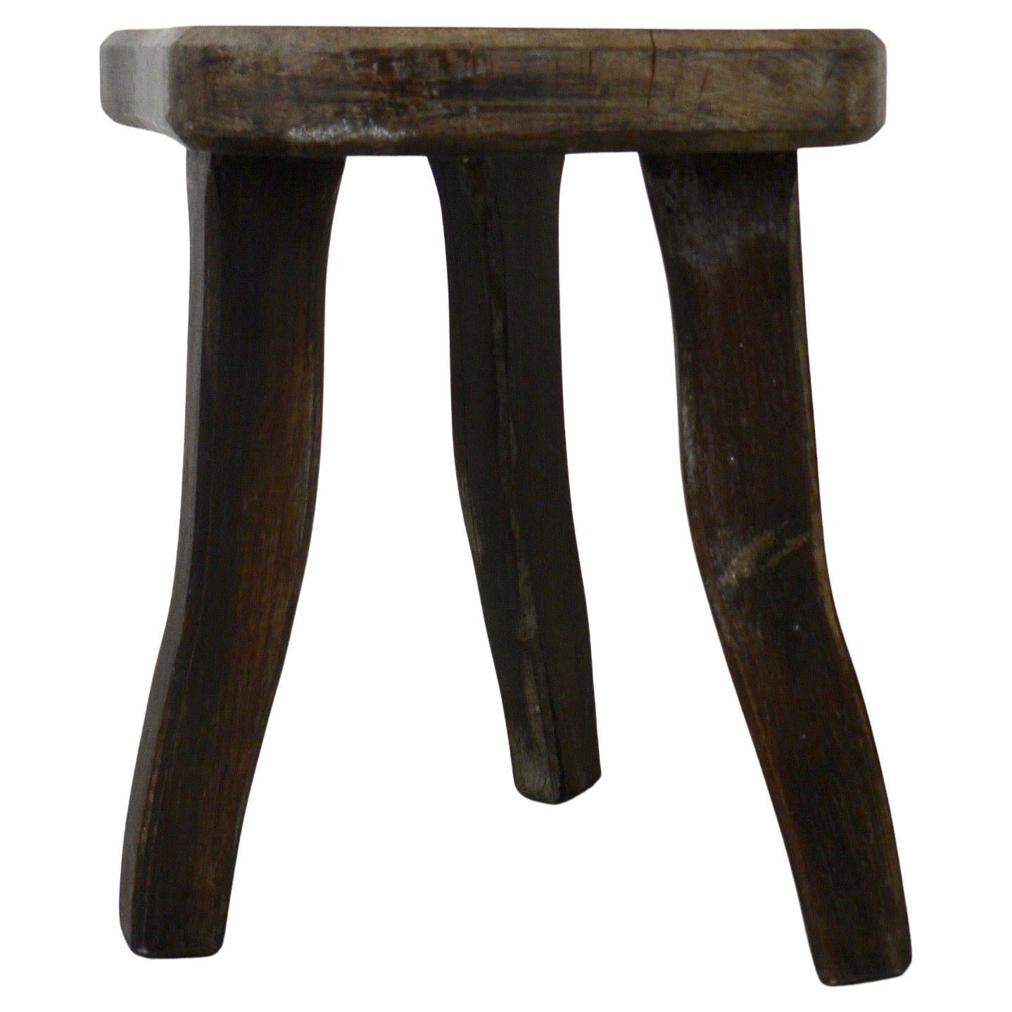 tripod shepherd's stool with a free-form seat France Early XXth century