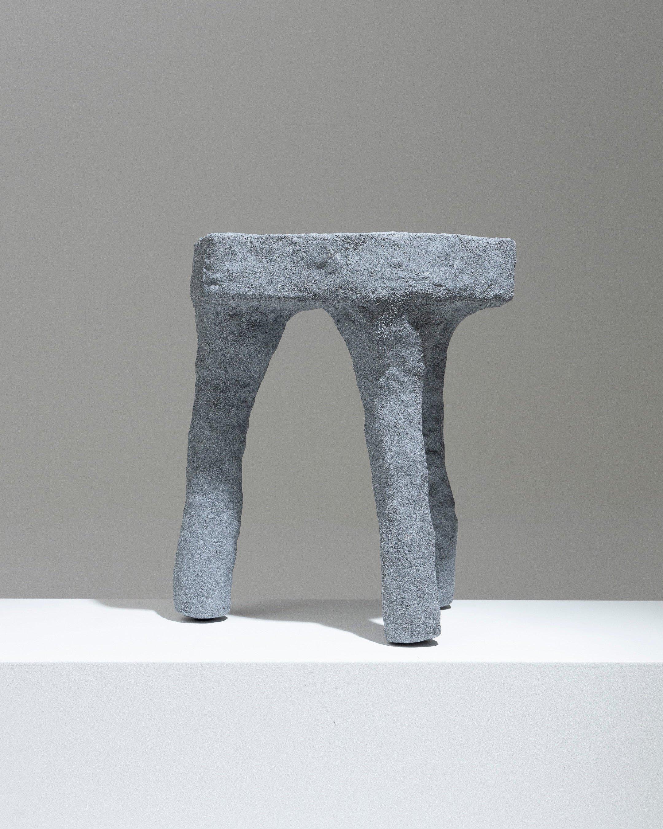 Tripod stool in plaster and light gray sand by designer Paul Hardy. Very good condition. 
Paul Hardy's work is distinguished by diverted construction materials such as sand, plaster, wood and glass. His creations are born from a careful search for