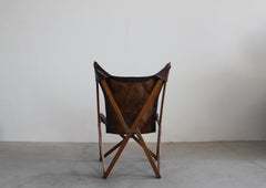 Sedia Foldes Tripolina in legno e pelle di Paolo Vigano anni '30