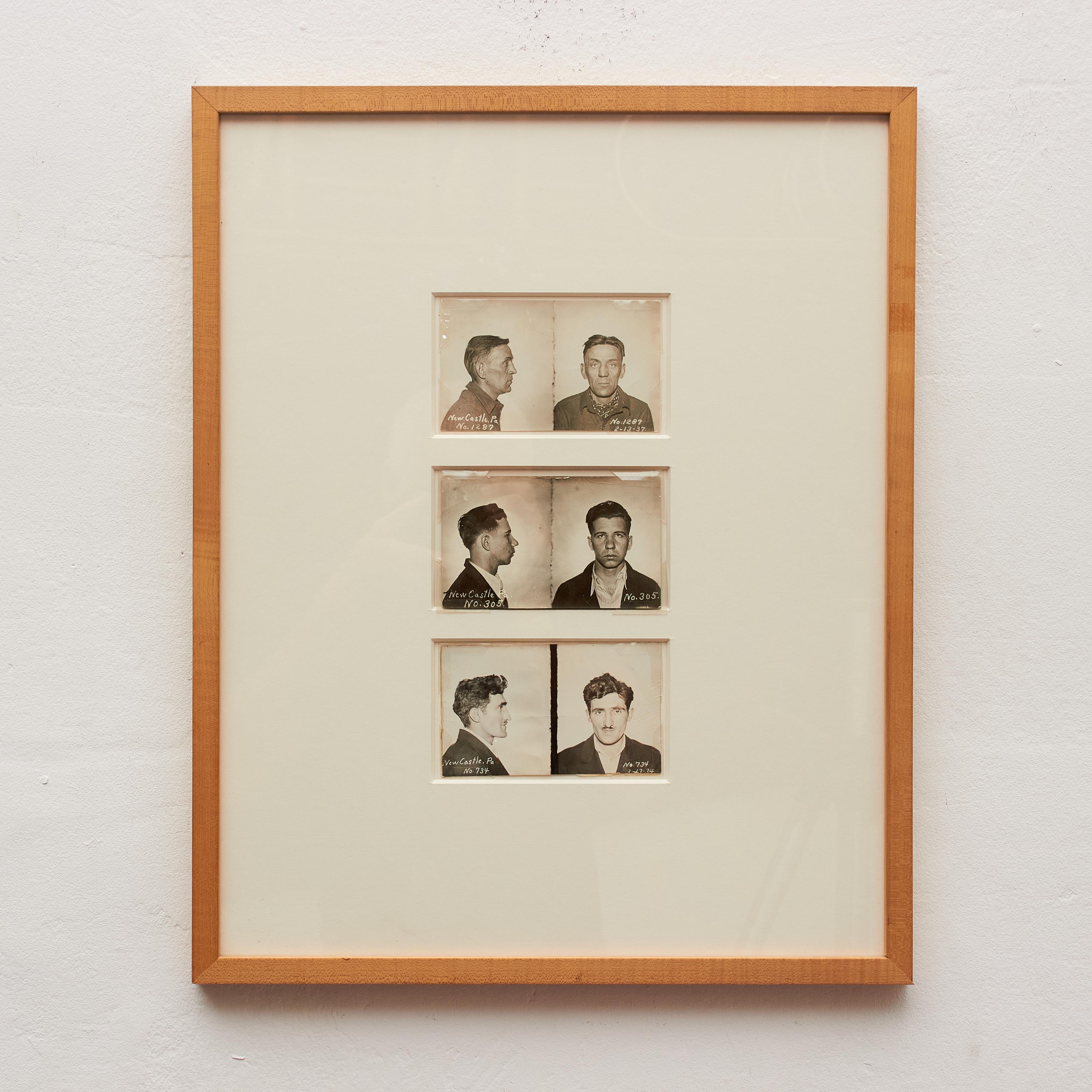 Immerse yourself in a glimpse of history with our unique composition – a trio of original 1930s prisoner photos elegantly framed together in a modern wooden frame. Each photograph tells a story, capturing the expressive faces of individuals in an