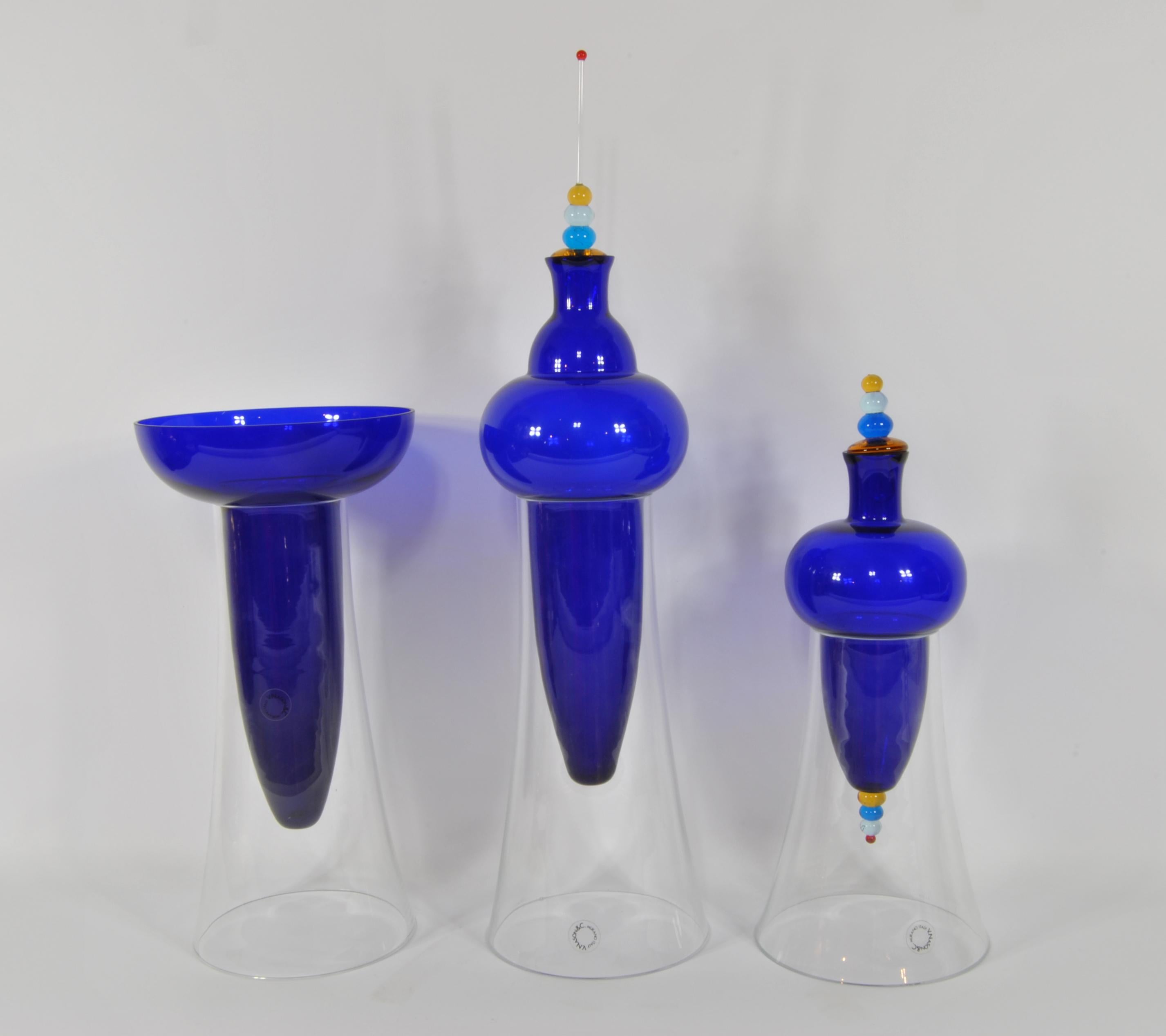 Triptych of vases, design Carlo Nason, production V. Nason & C..
Murano glass, crystal bases.
Measures: 1: diameter cm 14 x height 54,
2: diameter cm 14 x height 33,
3: diameter cm 14 x height 35.