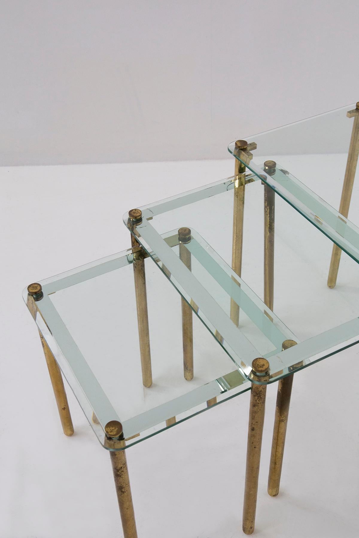 Mid-Century Modern Triptych of vintage Italian coffee tables in thick glass and brass For Sale