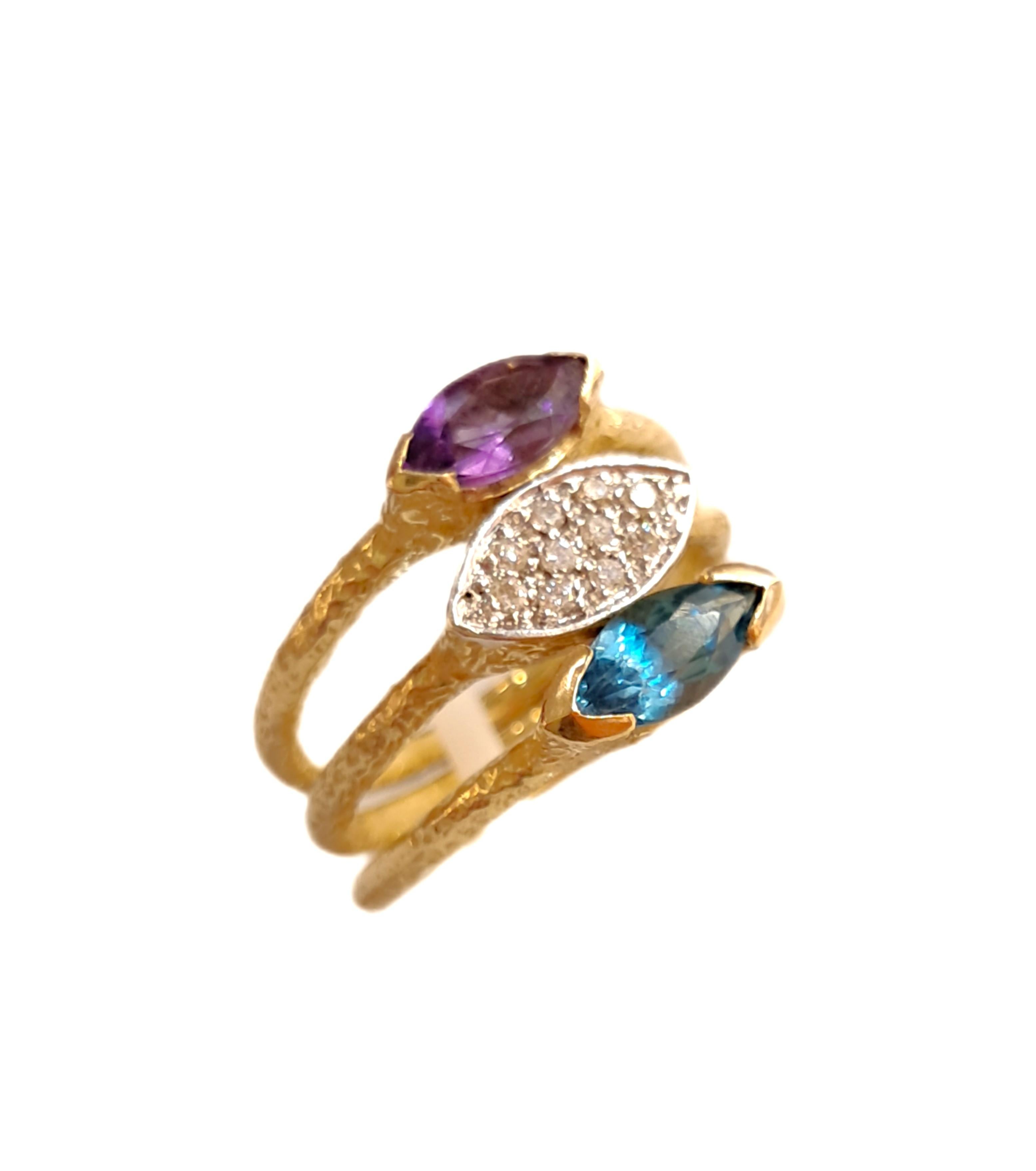 in vendita:  Tris Anelli Sacchi in Oro giallo 18k Ametista Diamanti e Topazio Blu 5