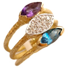 Tris Anelli Sacchi in Oro giallo 18k Ametista Diamanti e Topazio Blu