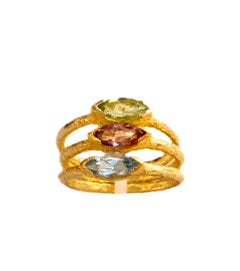 Tris Anelli Sacchi in Oro Giallo Satinato 18K con Peridoto Tormalina Acquamarina