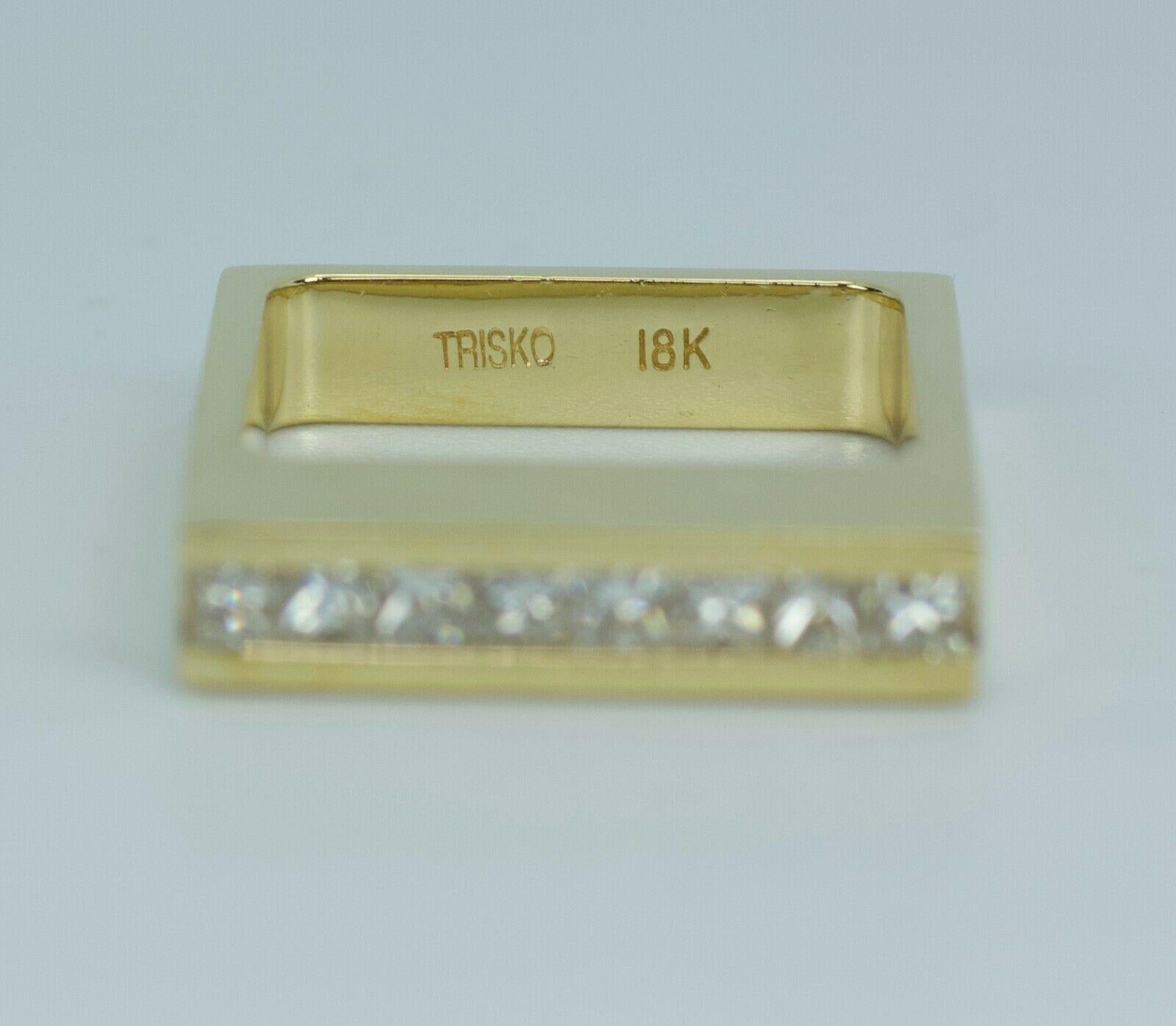 18k Yellow Gold Princess Cut Diamond Stackable band.
11.2 Grams
Ring Size 7.75
8 Princess Cut Diamonds 0.5 Carats Total Weight
Color: I Clarity: Vs2
these beautiful stackable ring are truly one of a kind! I do have the L shape princess cut band as