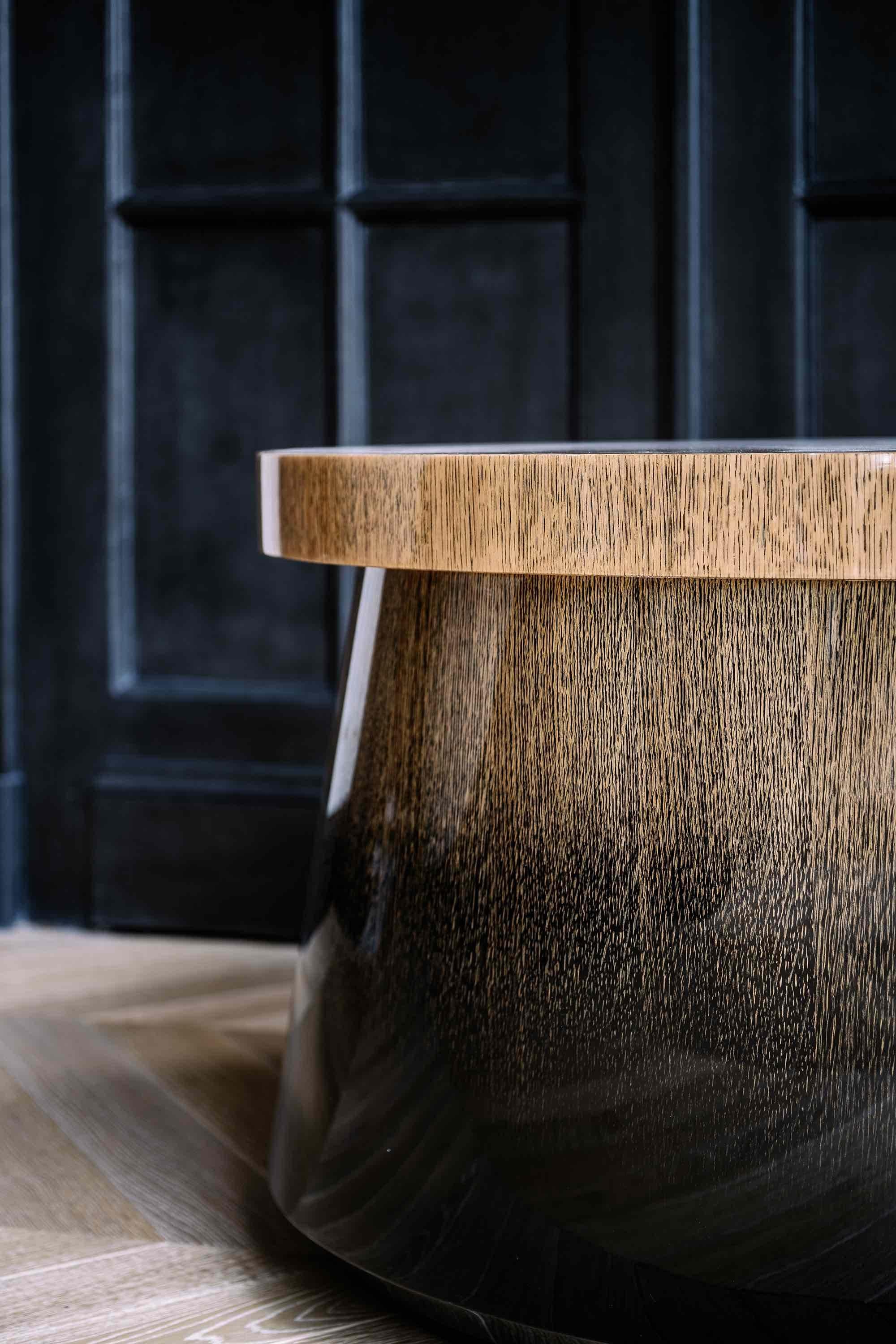 Temple coffee table, by Tristan Auer, is made in Light oak degraded with ink and covered with a glossy varnish.
Dimensions : 31,4