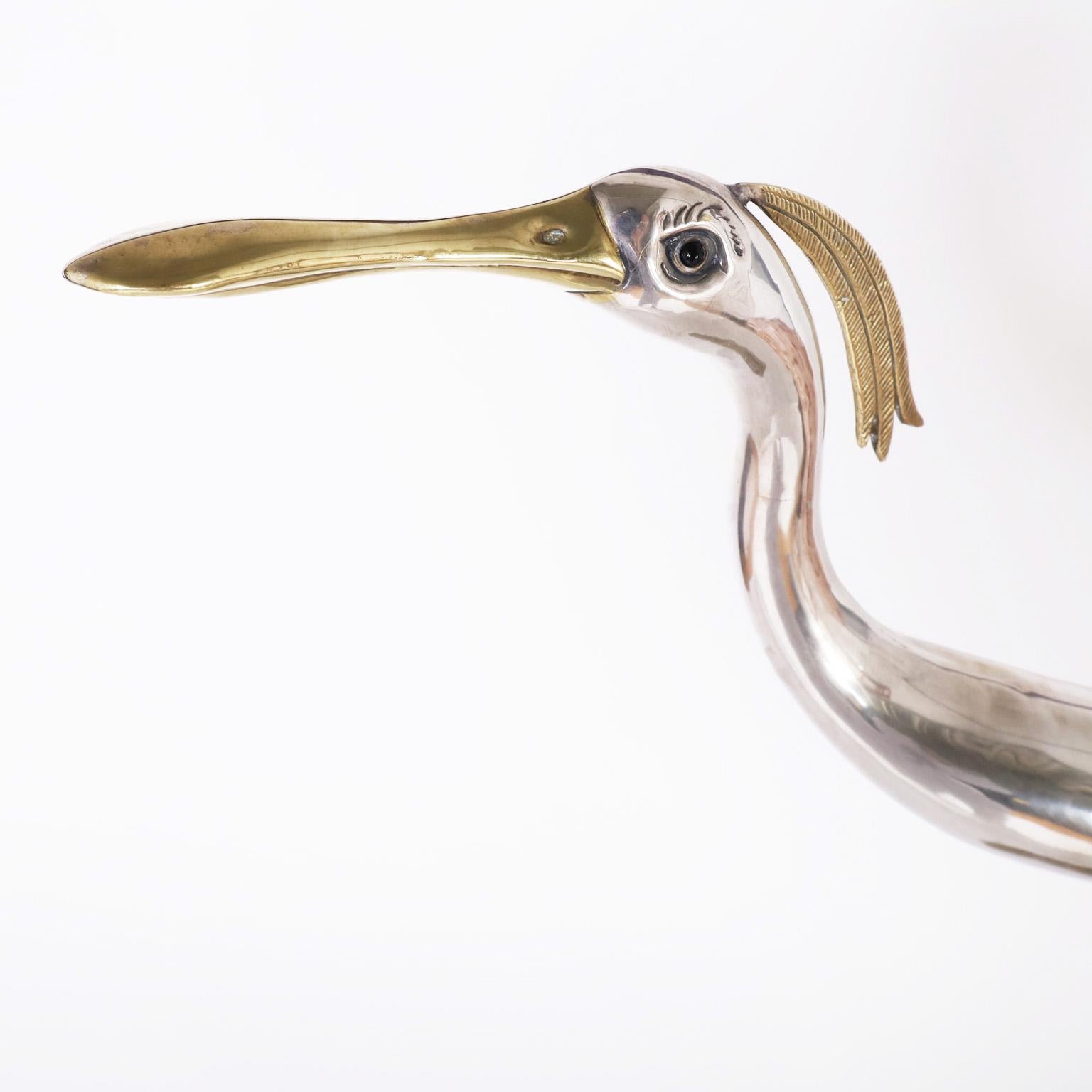Hand-Crafted Triton Shell Bird Sculpture For Sale