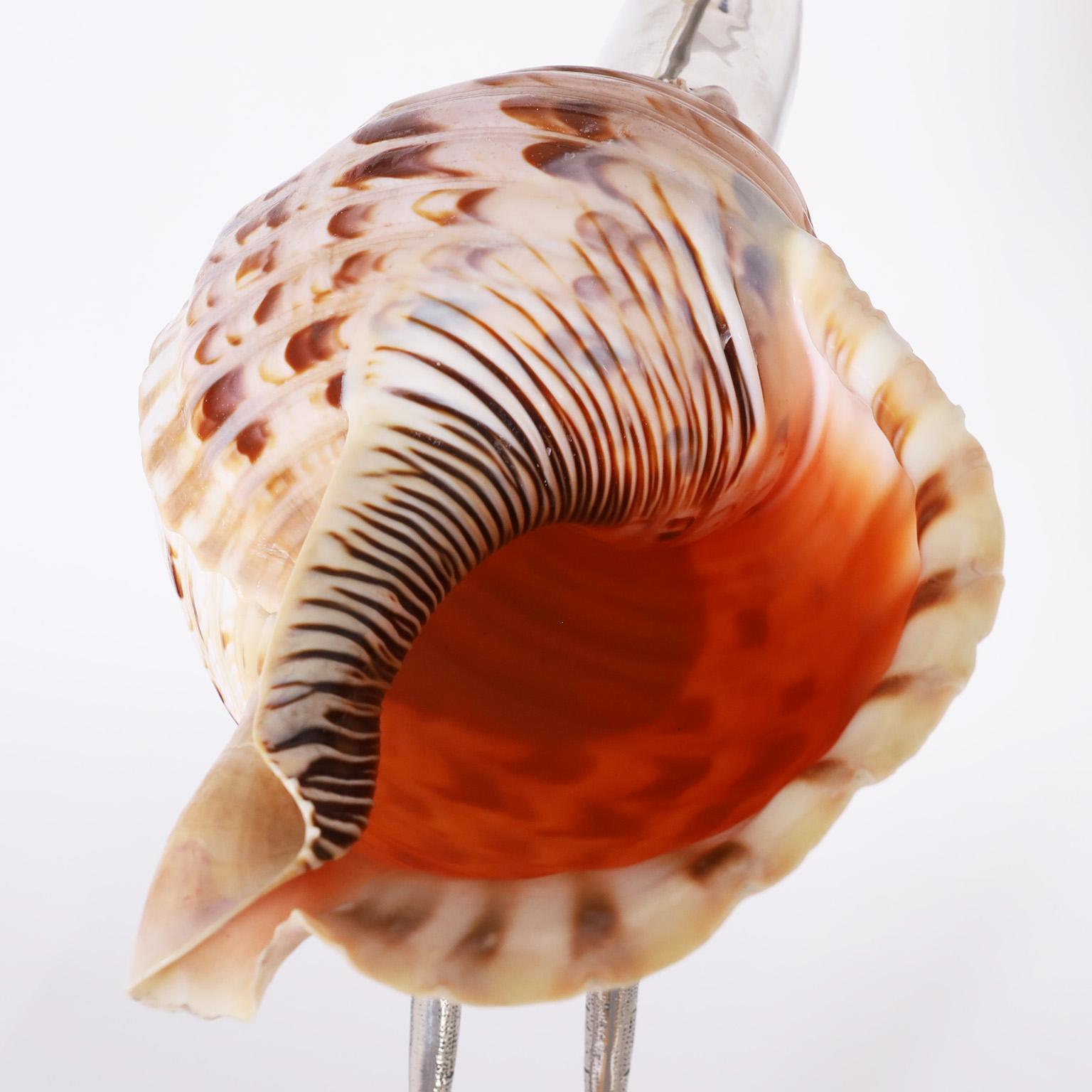 Metal Triton Shell Bird Sculpture For Sale
