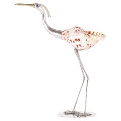 Sculpture d'oiseau en coquillage Triton