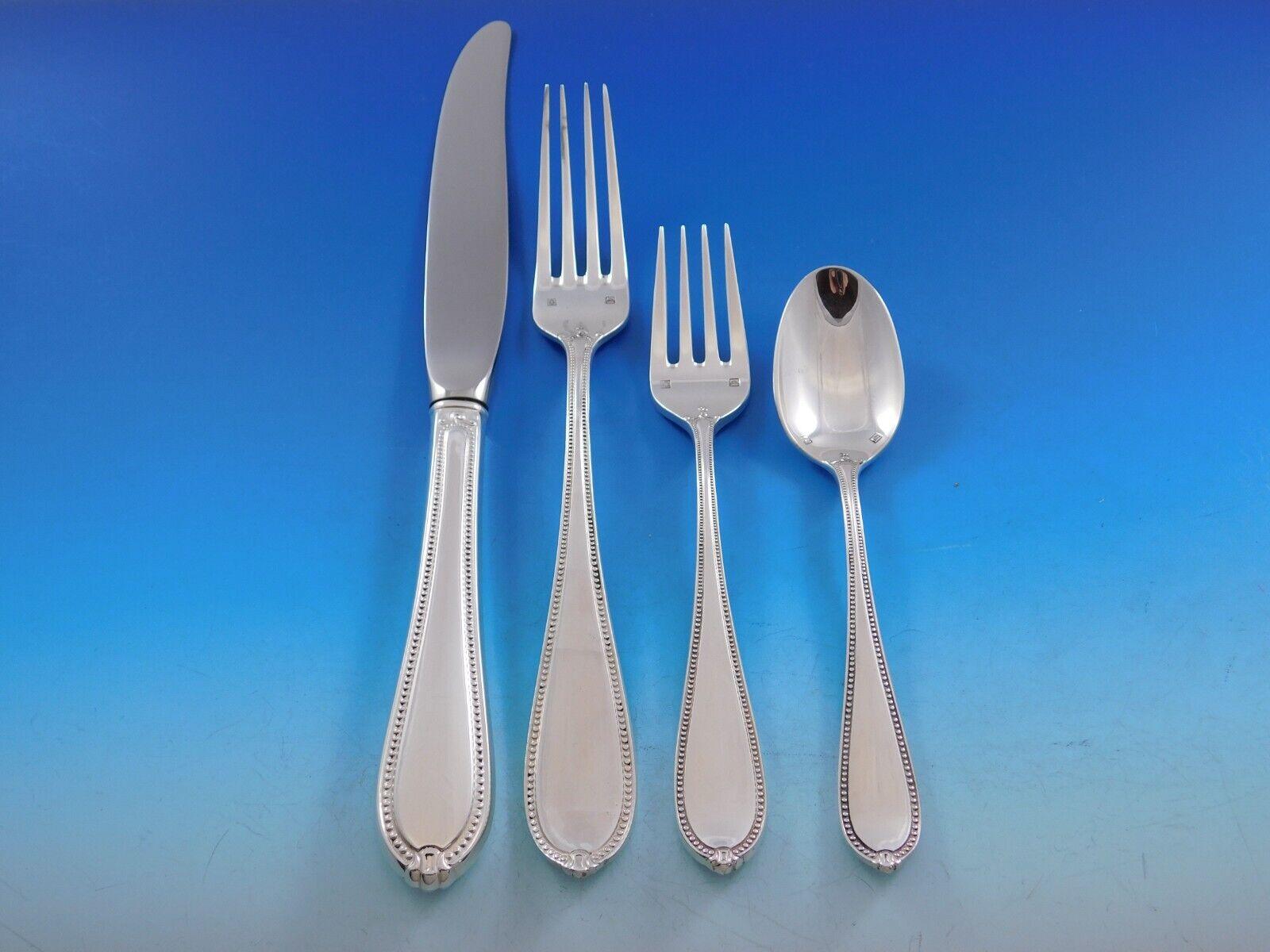 For a table that truly sets you apart, grace every meal with extraordinary sterling silver from Tuttle. 
Superb dinner size Triumph by Tuttle sterling silver flatware set, 65 pieces. This set includes:



12 dinner size knives, 10 1/8