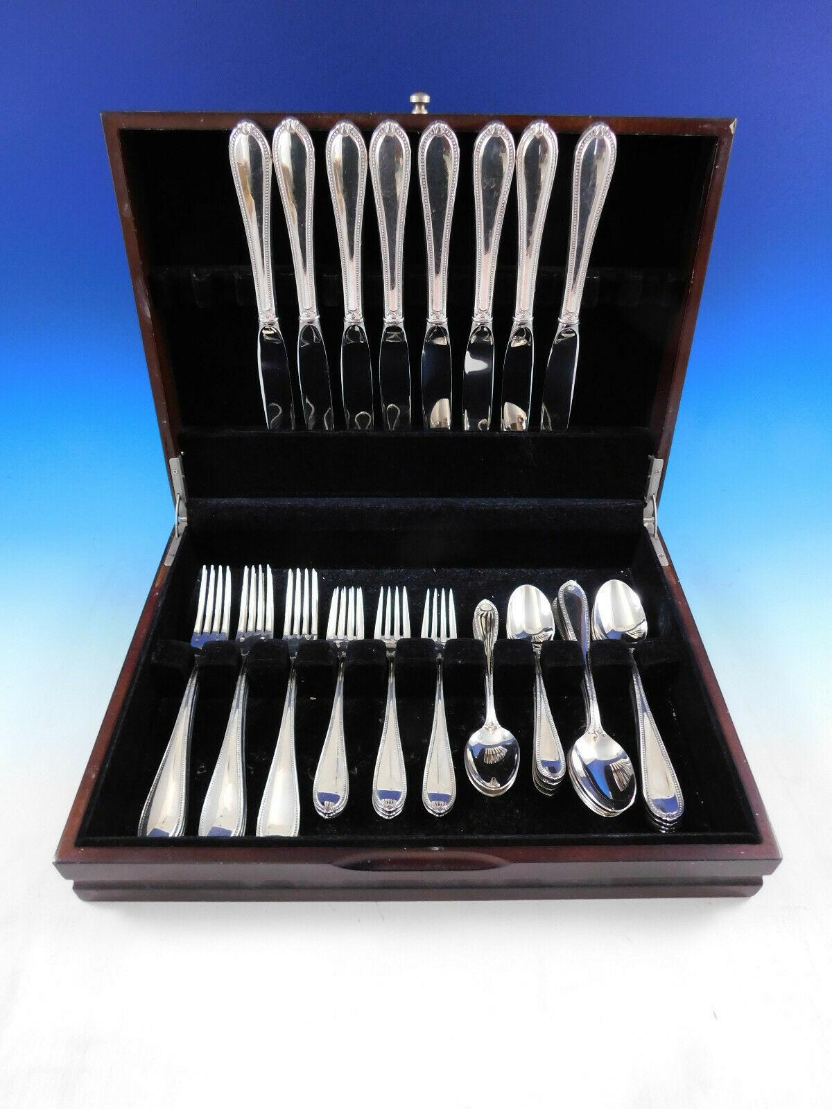 For a table that truly sets you apart, grace every meal with extraordinary sterling silver from Tuttle. 


Gorgeous Dinner Size Triumph by Tuttle sterling silver flatware set, 40 pieces. This set includes:



8 Dinner Size Knives, 10 1/8